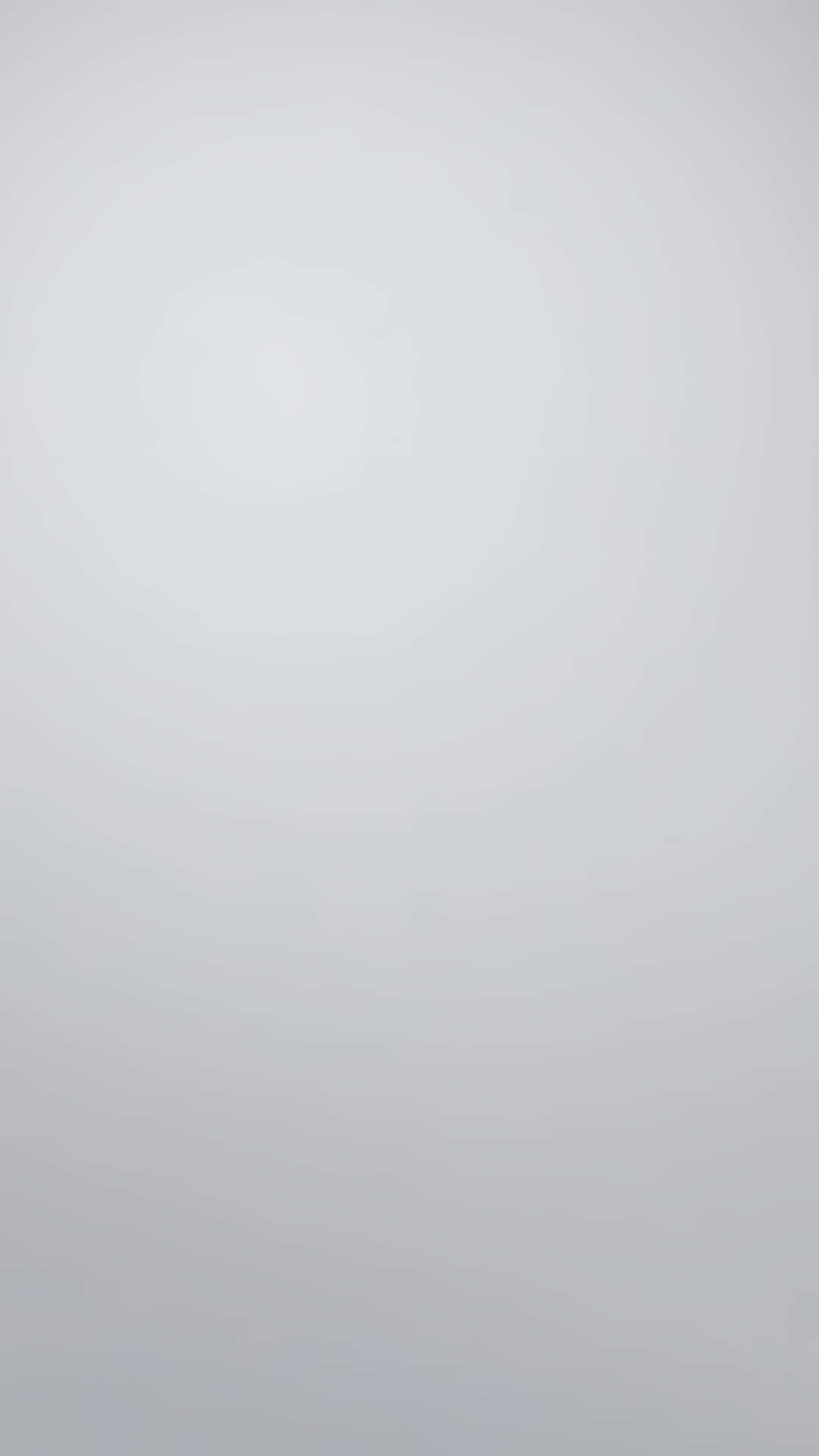 Clean Minimalist Grey Gradient Texture 壁紙 — 淡灰色調柔和漸變，融入柔和發光的中心。