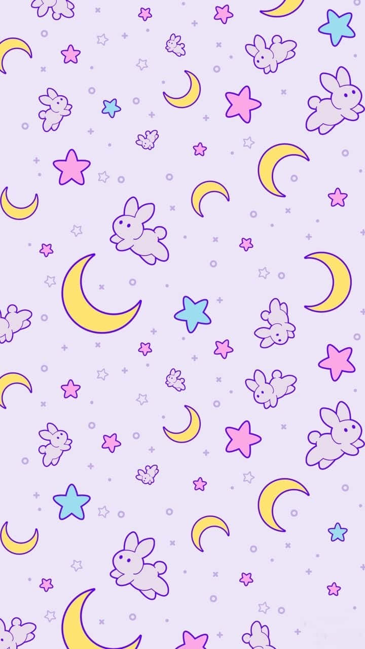 Sailor Moon Pattern 桌布 壁紙 — 淡紫色背景，點綴著粉紅色、黃色和藍色的漂浮卡通兔子、新月和星星。