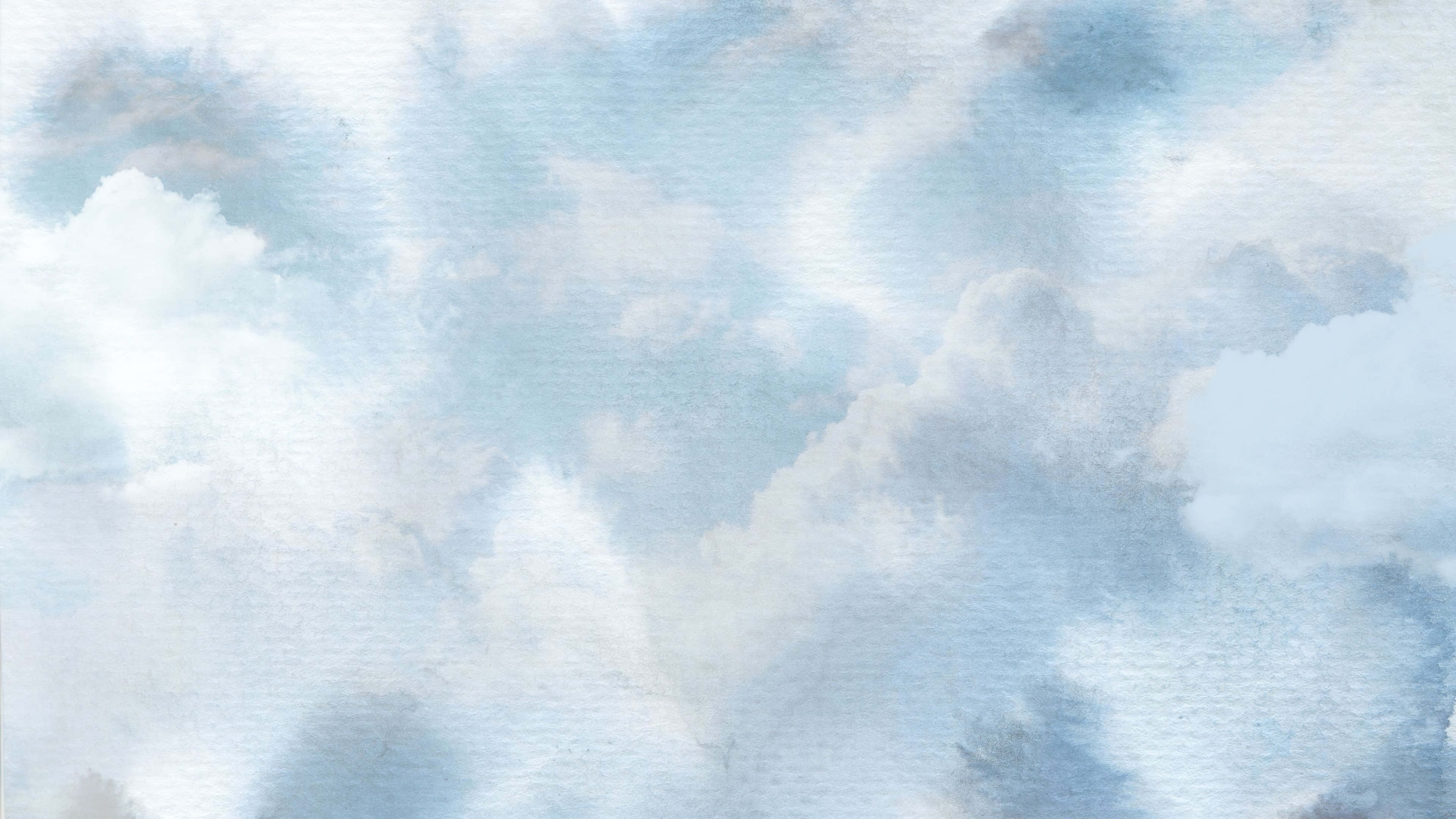 美學雲朵 桌布 壁紙 — 淡藍色和白色的柔和水彩雲朵在寧靜的天空中飄浮，帶有輕柔的紋理。