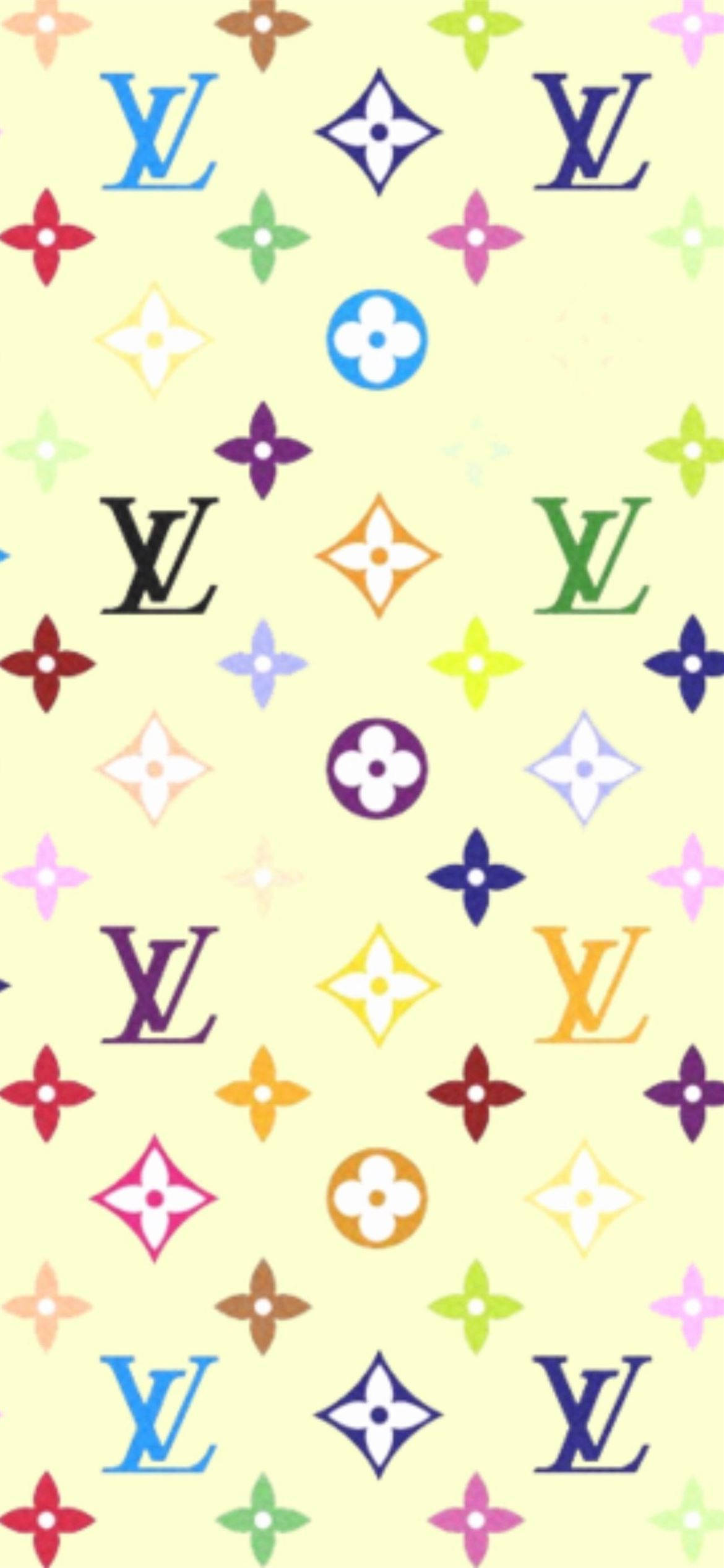 圖案 桌布 壁紙 — 淡黃色背景上充滿活力的重複圖案，包含多色 Louis Vuitton 標誌和花卉圖案。