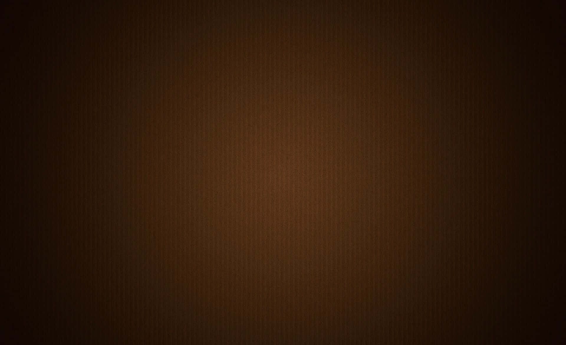 Brown 桌布 壁紙 — 深棕色的平滑漸變，帶有細微紋理，從深色邊緣漸變到溫暖的中心。