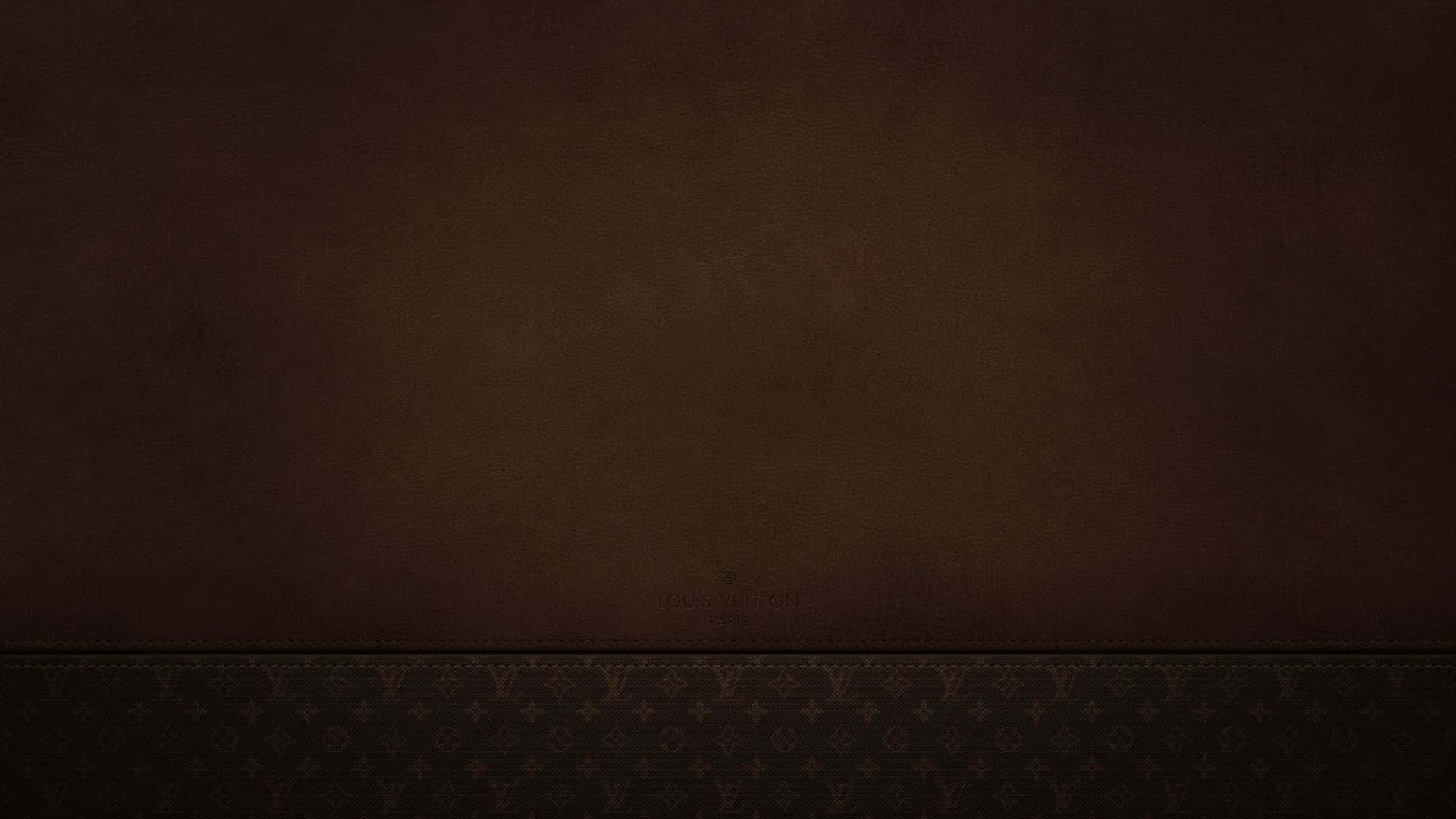桌布 壁紙 — 深棕色紋理皮革牆，底部邊緣帶有微妙的 Louis Vuitton 字母圖案。