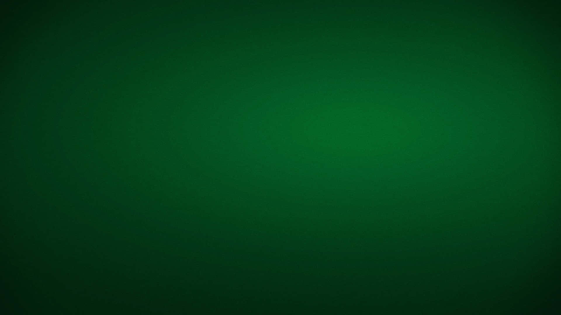 純色 桌布 壁紙 — 深森林綠色平滑漸變至較暗邊緣，營造出極簡抽象背景。