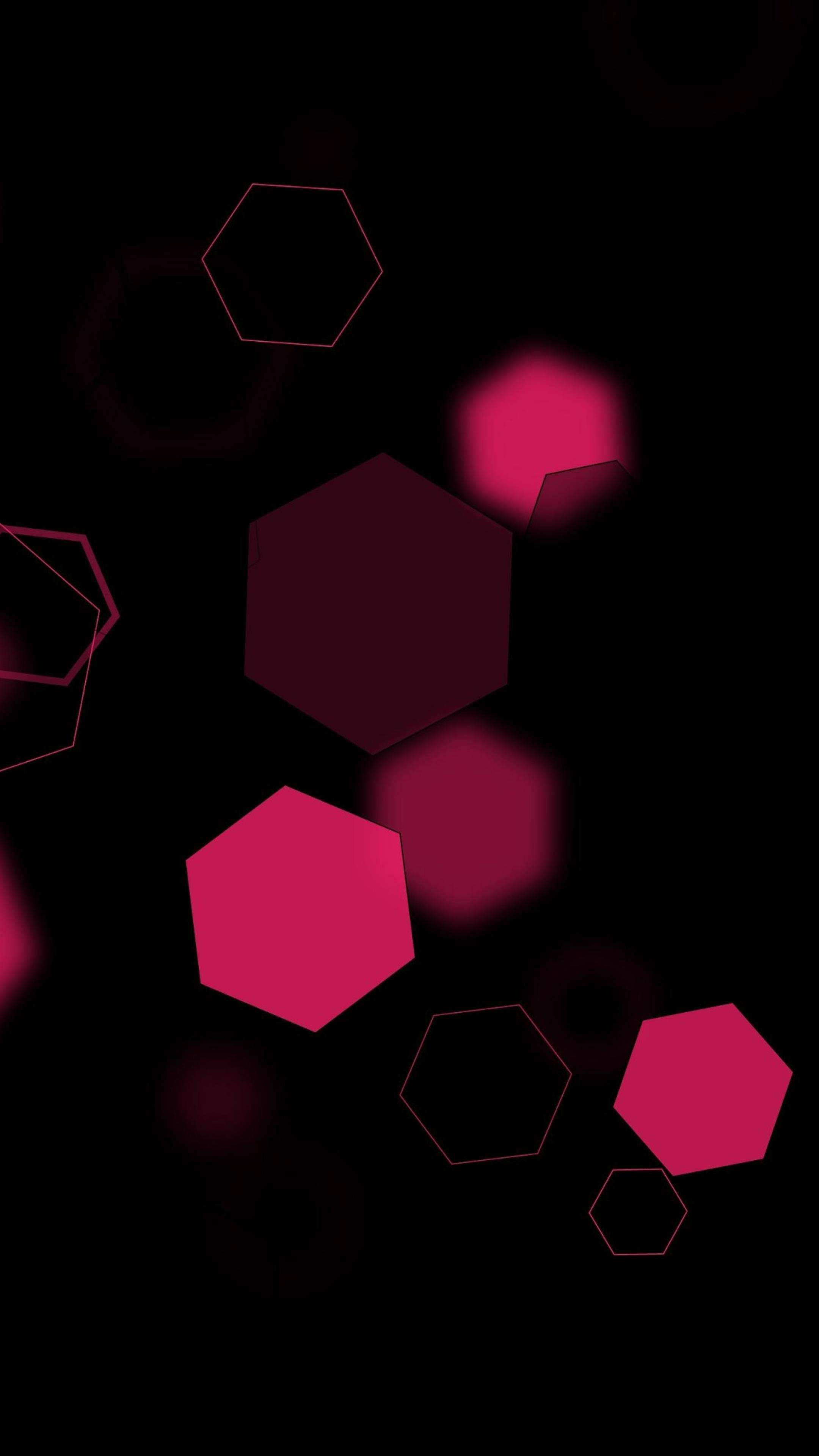Minimalist Phone 桌布 壁紙 — 深洋紅色和帶輪廓的粉紅色浮動六邊形在黑色虛空中柔和發光。