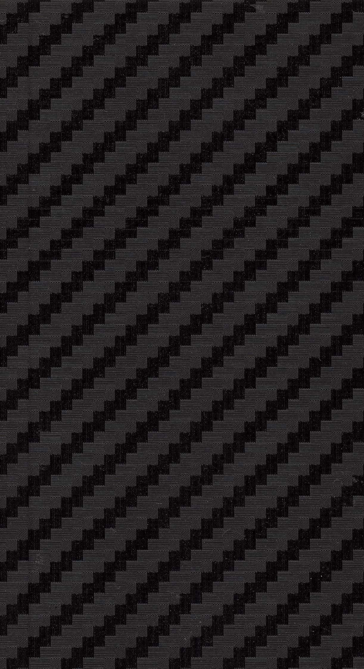 Carbon Fiber iPhone 桌布 壁紙 — 深灰色和黑色的斜紋碳纖維編織圖案，表面帶有紋理。