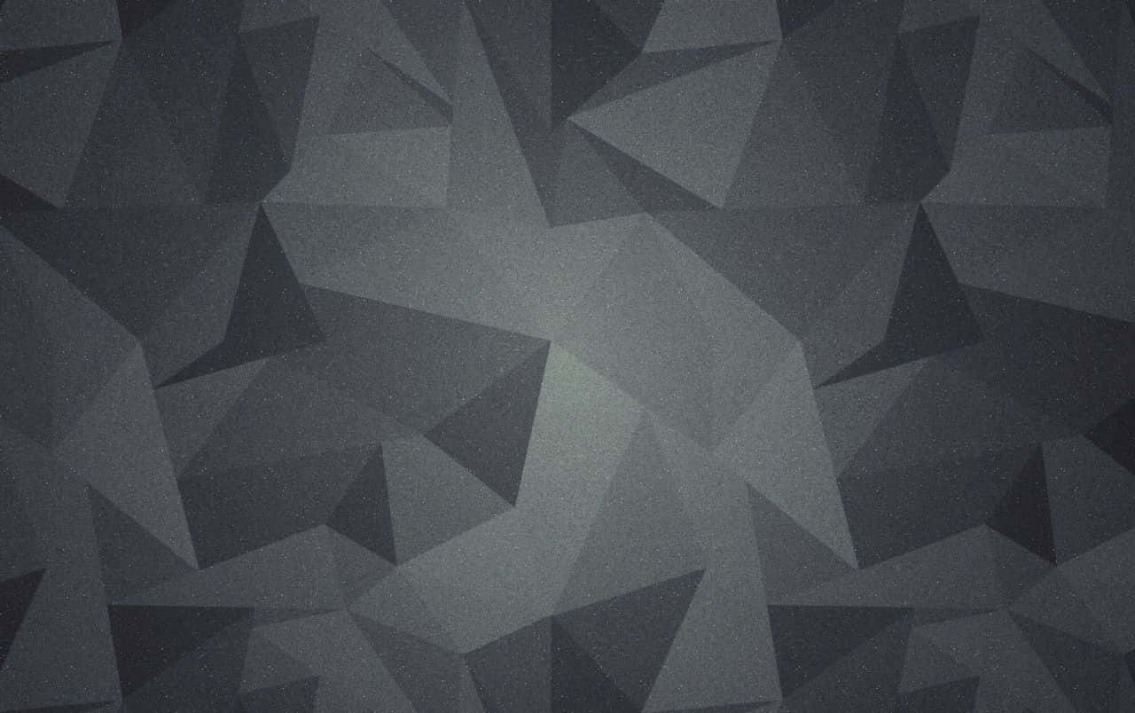 Geometric Shapes 桌布 壁紙 — 深灰色抽象壁紙，帶有低多邊形幾何圖案，呈現三角形切面及細膩質感。