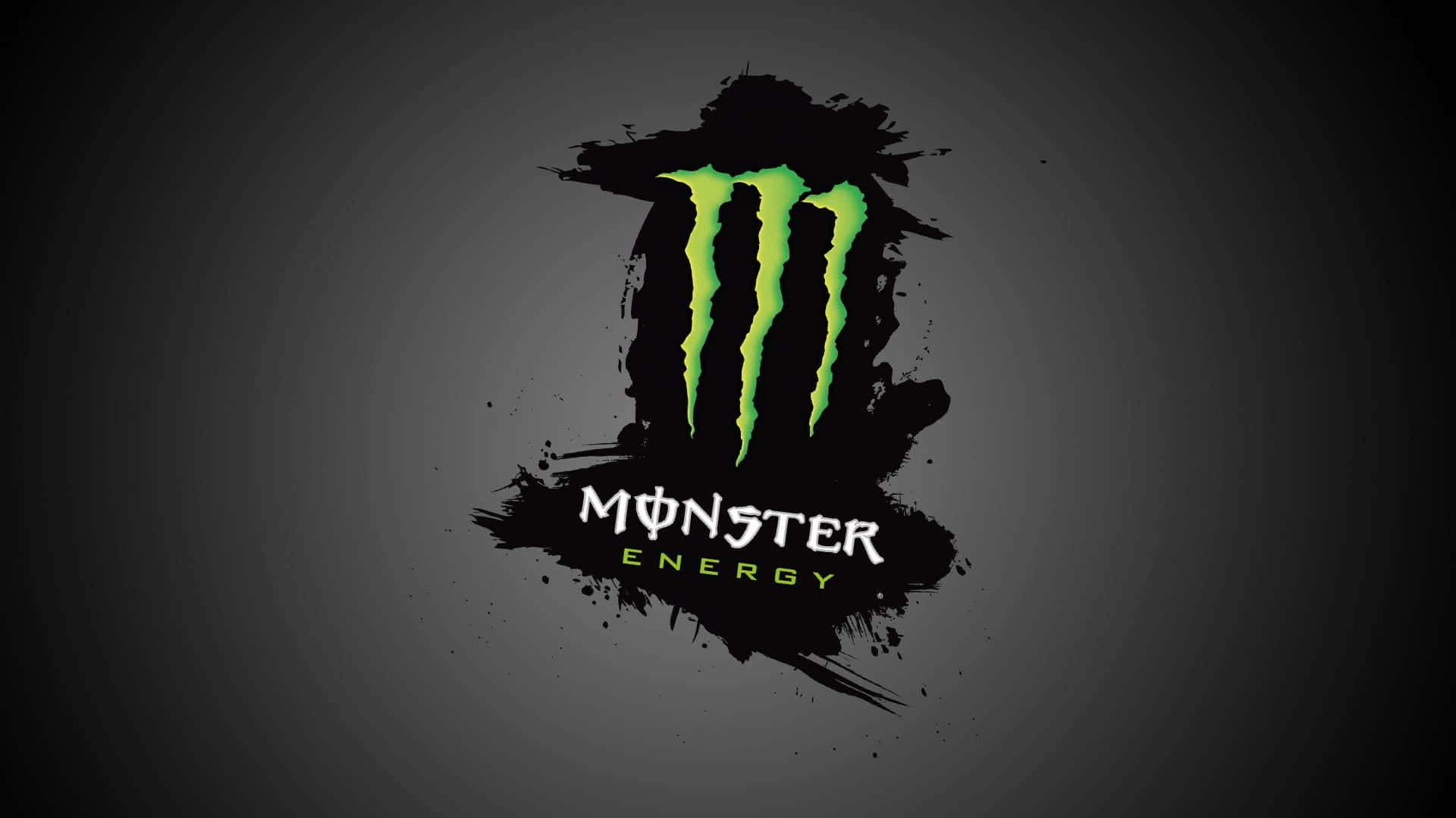 怪物 桌布 壁紙 — 深灰色漸變背景上帶有黑色潑濺設計的鮮綠色Monster Energy標誌。