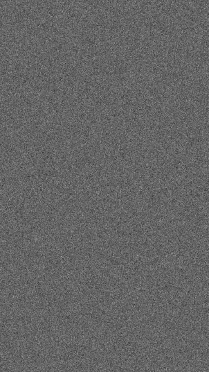 Solid Grey 桌布 壁紙 — 深灰色紋理織物的特寫，帶有微妙的編織圖案。