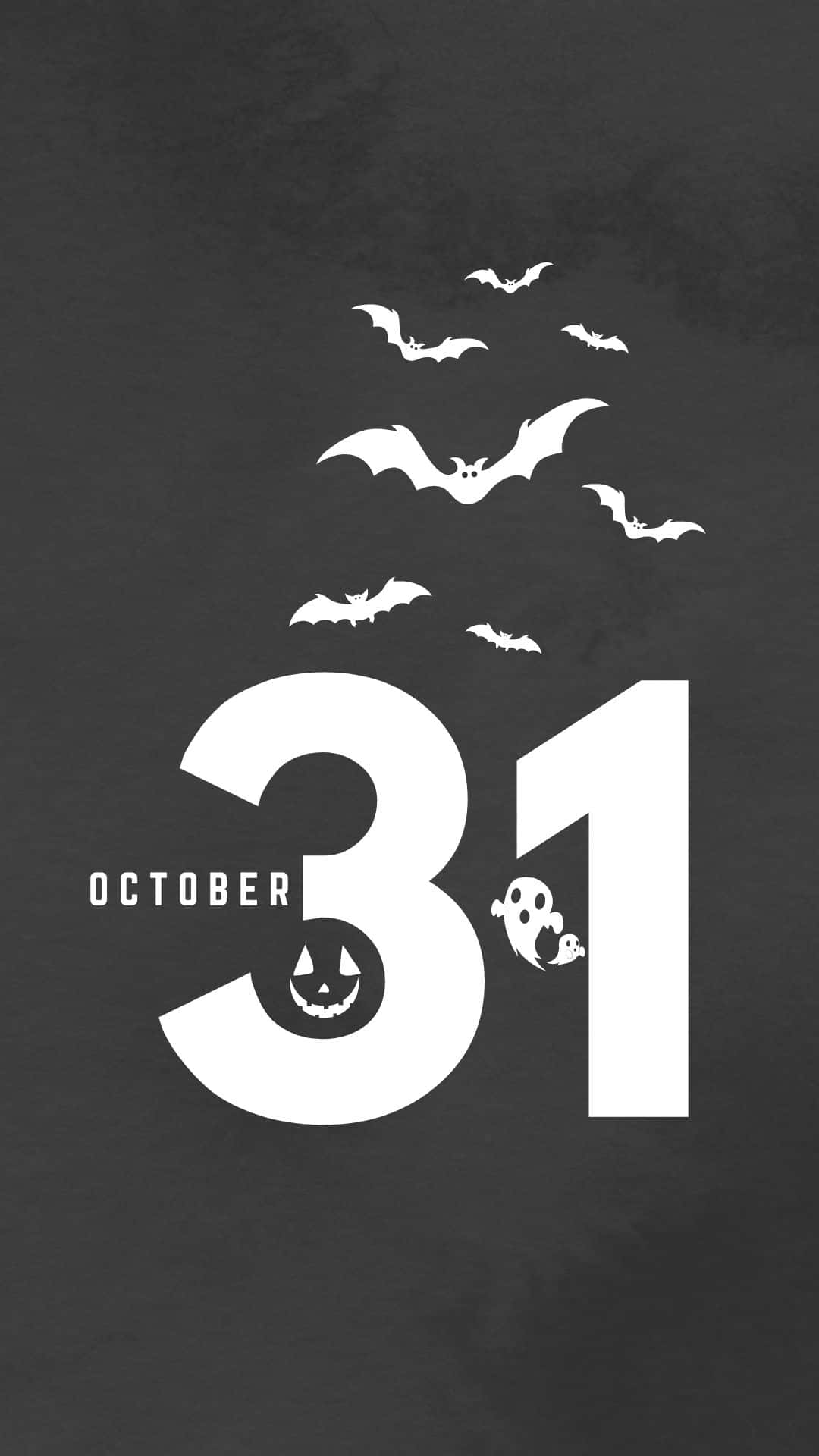 October 31st 桌布 壁紙 — 深灰色背景上粗體白色10月31日文字，飛翔的蝙蝠、南瓜燈和幽靈。
