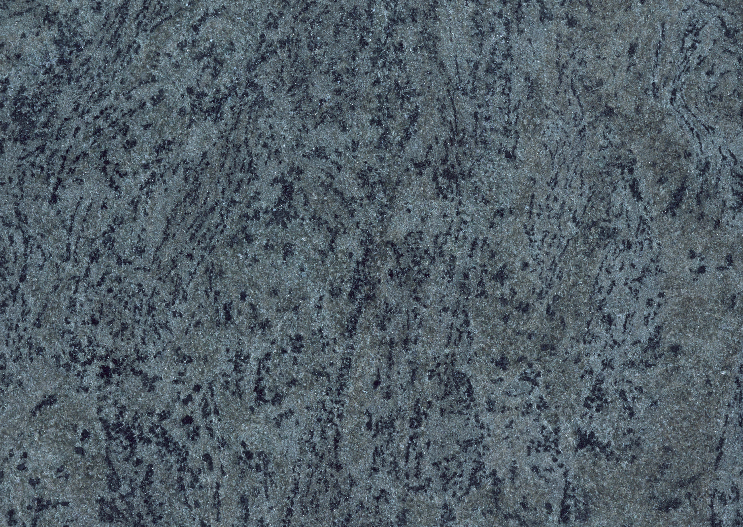 Granite 桌布 壁紙 — 深灰色花崗岩的特寫，帶有旋轉的黑色和白色礦物脈，形成天然石材紋理。