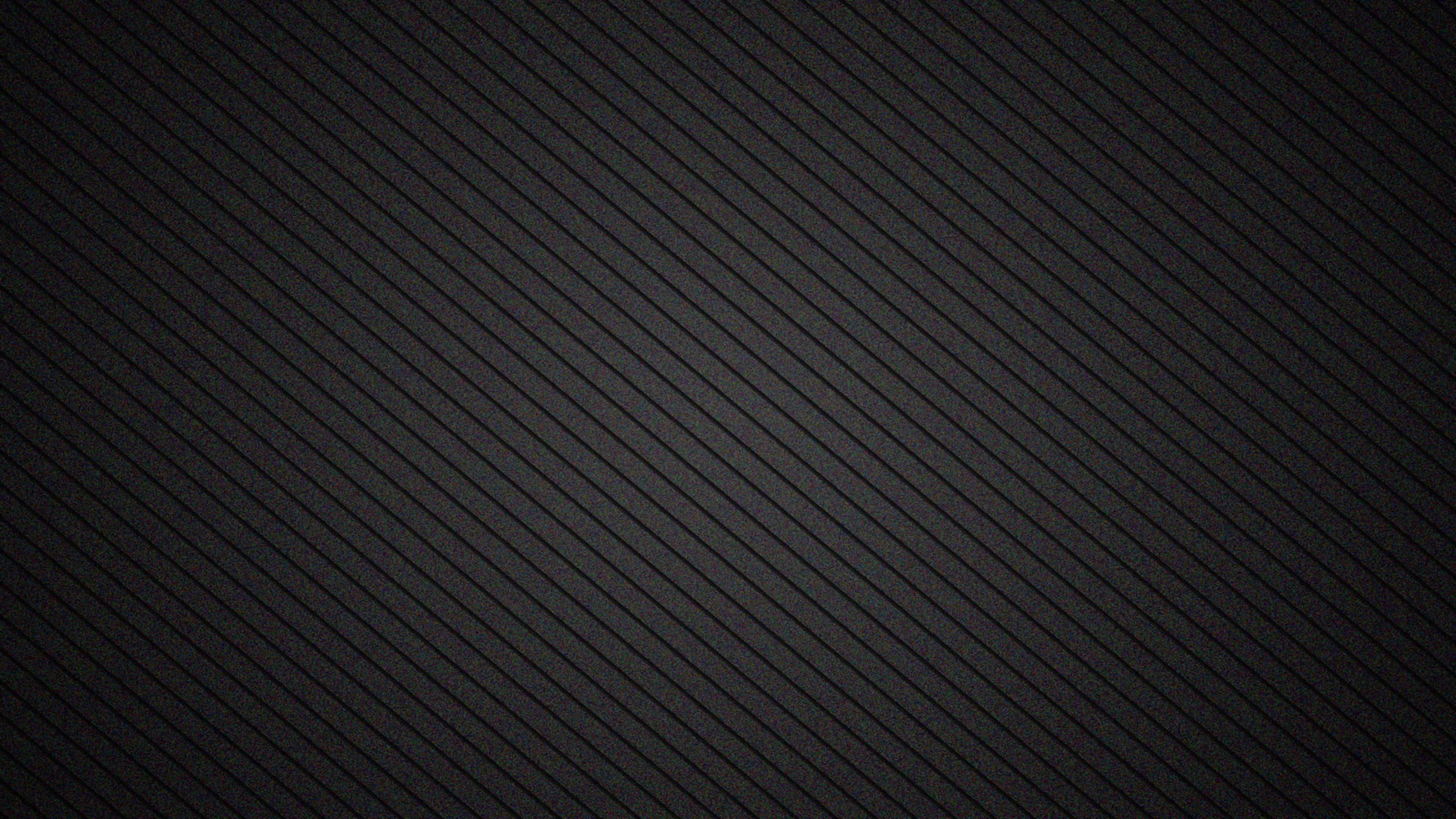 texture 桌布 壁紙 — 深炭灰色背景，帶有微妙的對角線棱紋紋理，營造出時尚簡約的圖案。