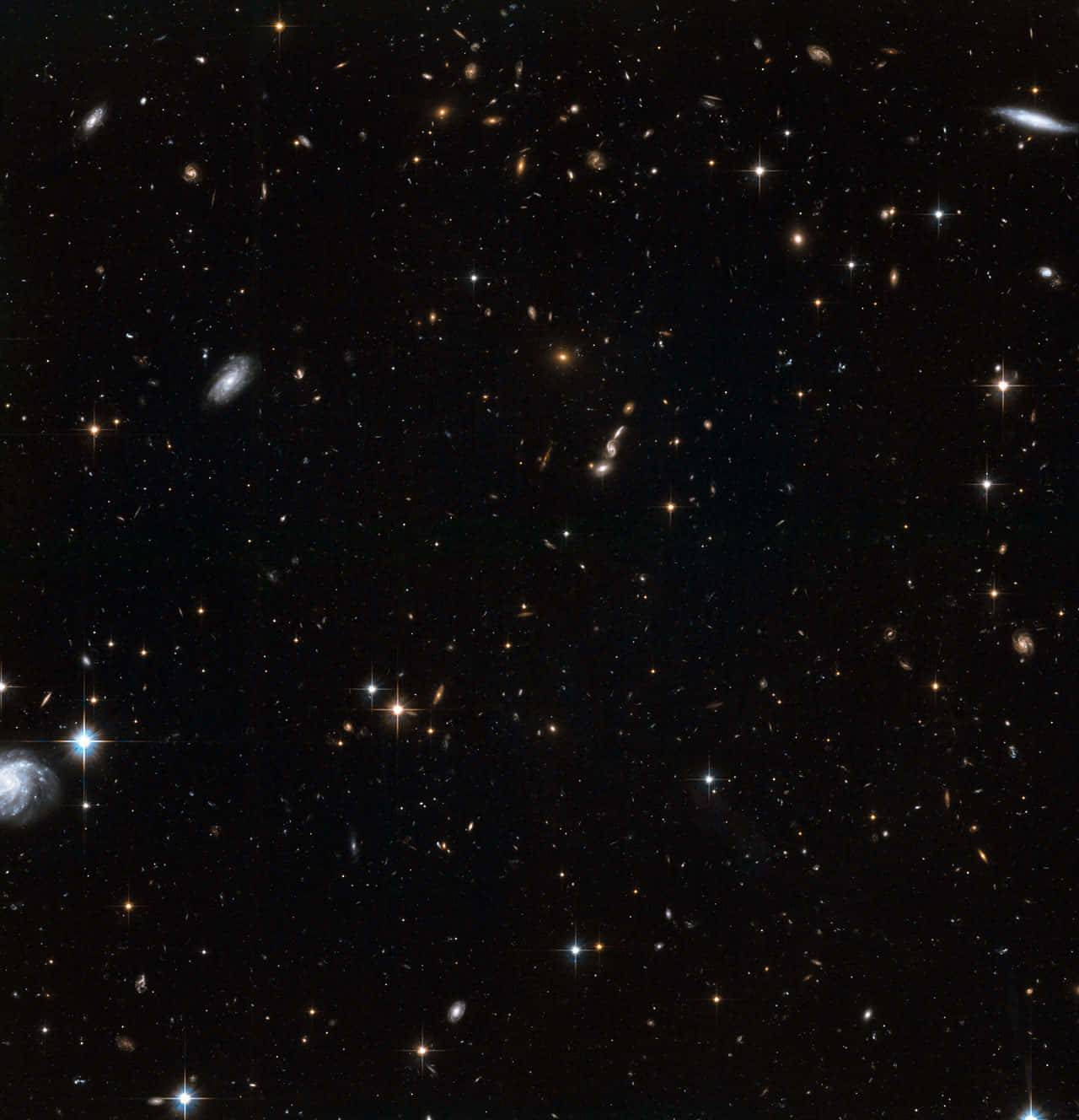 Galaxy Stars 桌布 壁紙 — 深空景觀，充滿無數恆星和遙遠星系，在黑色虛空中閃耀。
