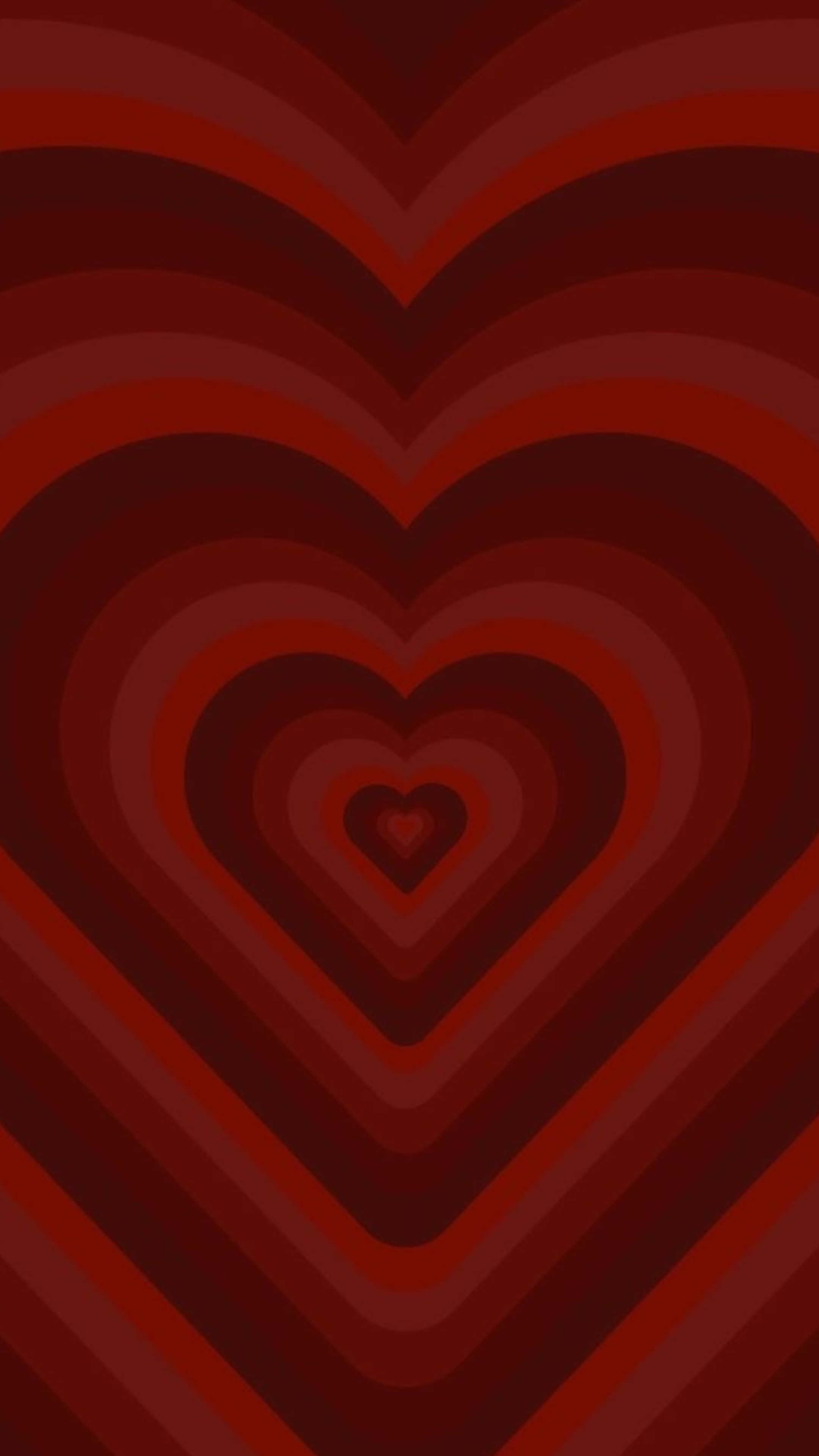 Red Hearts 桌布 壁紙 — 深紅色中充滿活力的同心心形，從中心散發出催眠般的復古圖案。