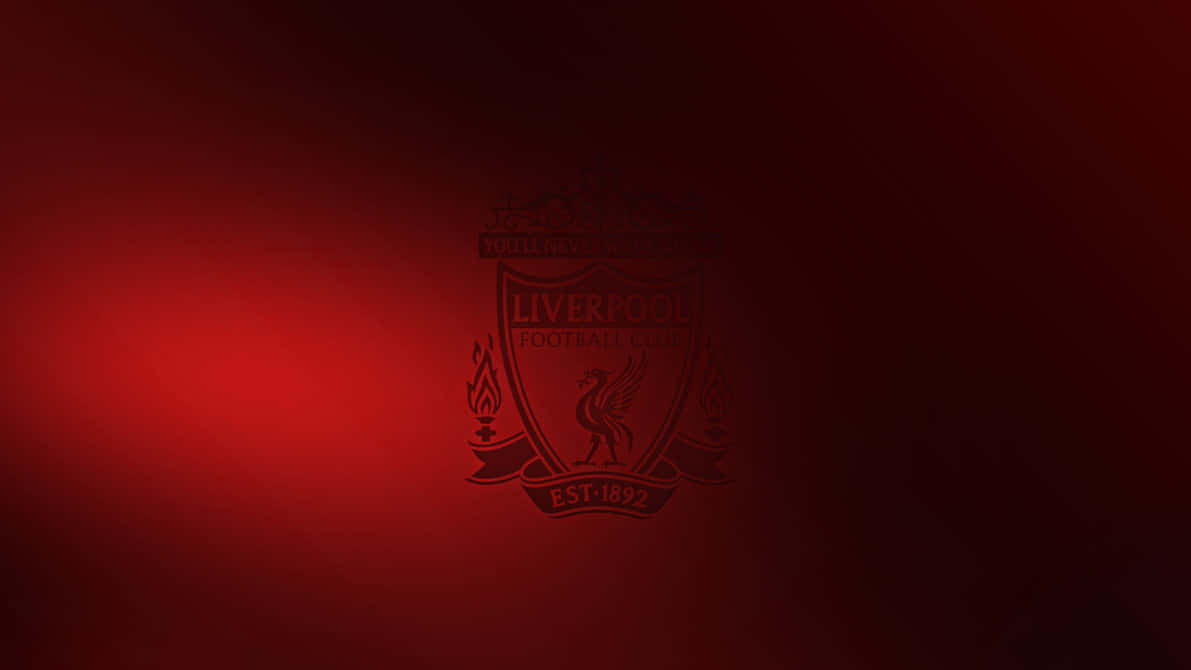 Liverpool Fc Desktop 桌布 壁紙 — 深紅色漸變背景中央有利物浦足球俱樂部徽章的微妙剪影。