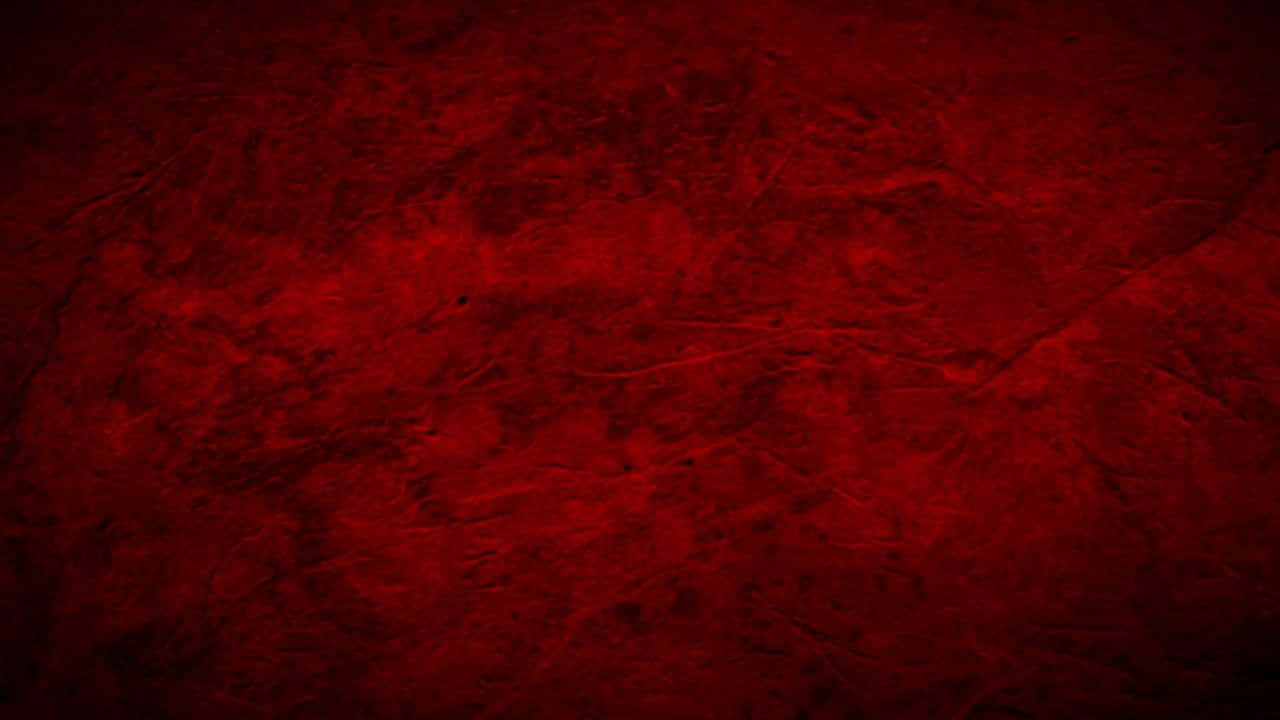 Red Grunge 桌布 壁紙 — 深紅色紋理表面，帶有細微裂紋和色調變化，營造出豐富的抽象背景。