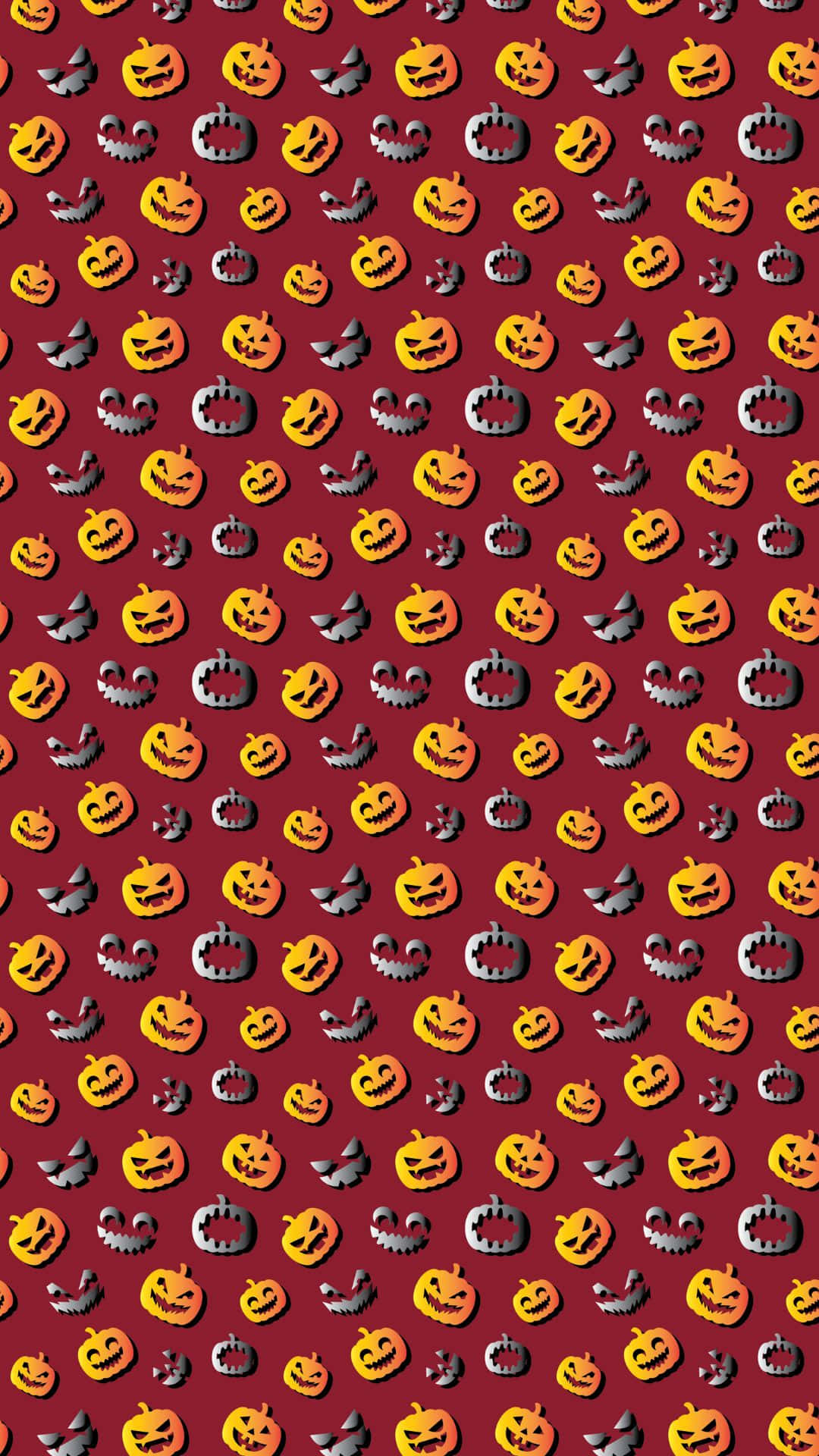 Cute Pumpkin 桌布 壁紙 — 深紅色背景上重複出現橙色南瓜燈和灰色蝙蝠的圖案。