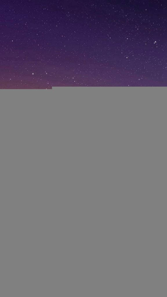 簡約手機 桌布 壁紙 — 深紫色調下，廣闊灰色平原上佈滿閃爍星星的寧靜夜空。