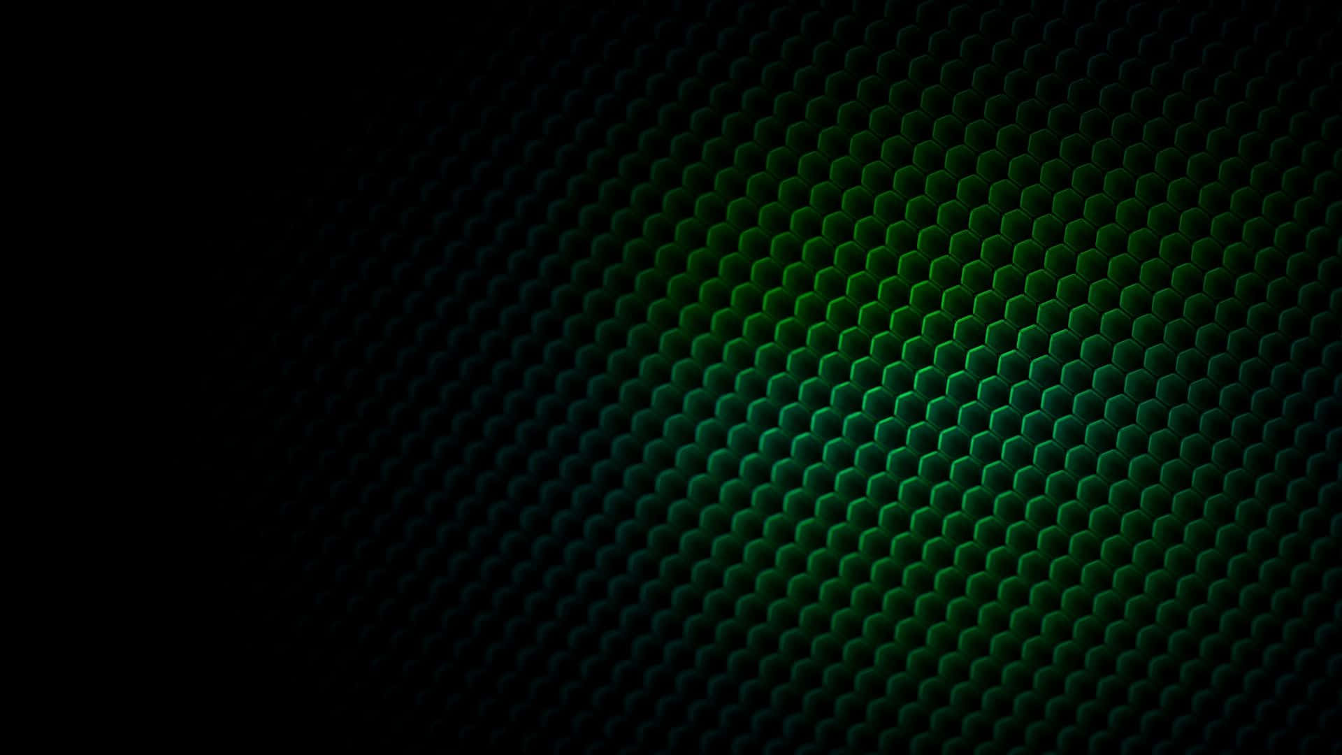 Dark Green Grunge 桌布 壁紙 — 深綠色六角形網格圖案沿對角漸層從黑色漸變為充滿活力的綠色。