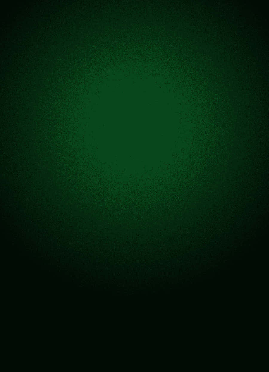 Green And Black 桌布 壁紙 — 深綠色漸變背景，帶有微妙的斑點紋理，邊緣漸變為黑色。