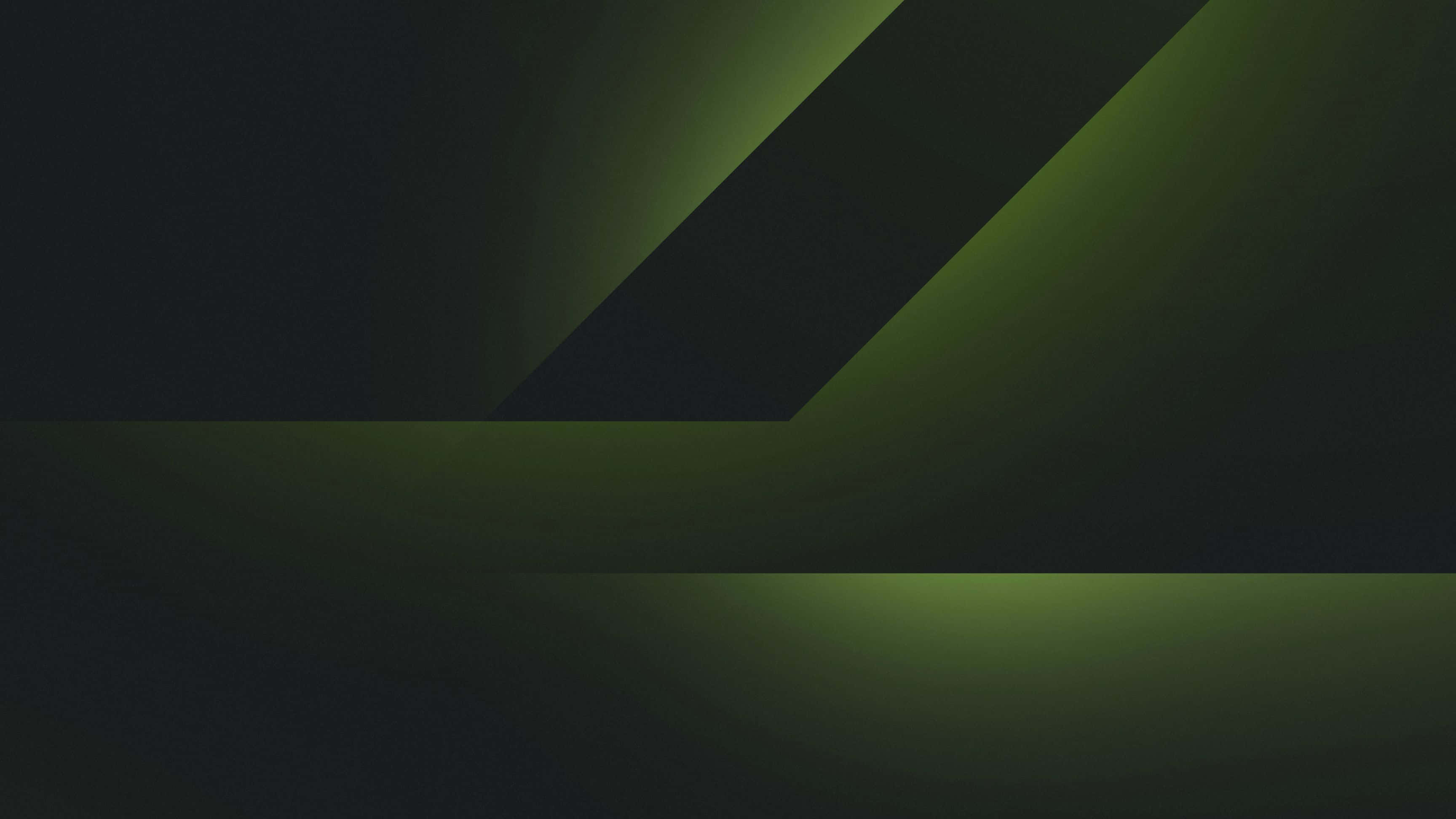 Abstract Green 桌布 壁紙 — 深綠色發光的抽象幾何形狀，在帶有柔和光線漸變的深色背景上。
