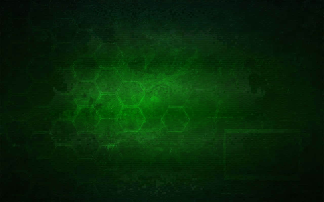Green Technology 桌布 壁紙 — 深綠色紋理背景，帶有發光的六邊形圖案和模糊的矩形輪廓，營造出賽博龐克氛圍。