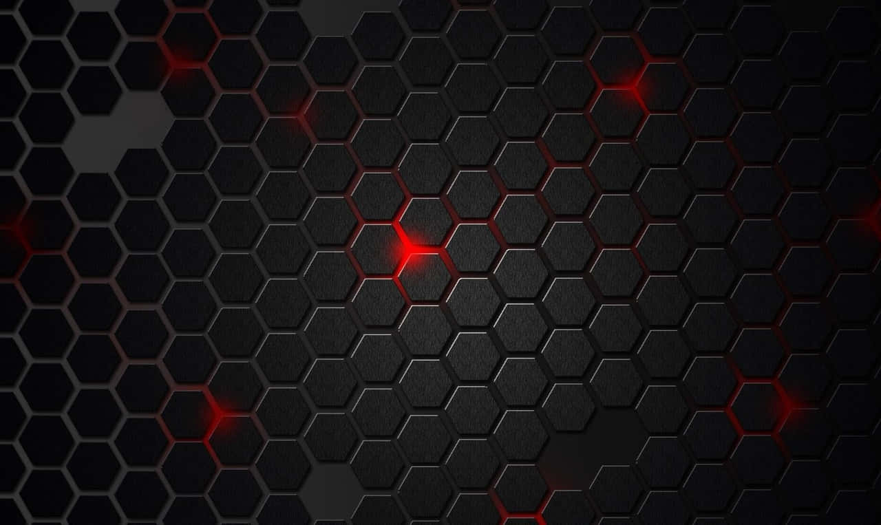 Hexagon 桌布 壁紙 — 深色六邊形網格搭配發光紅色點綴，營造出未來科技風格的桌布。