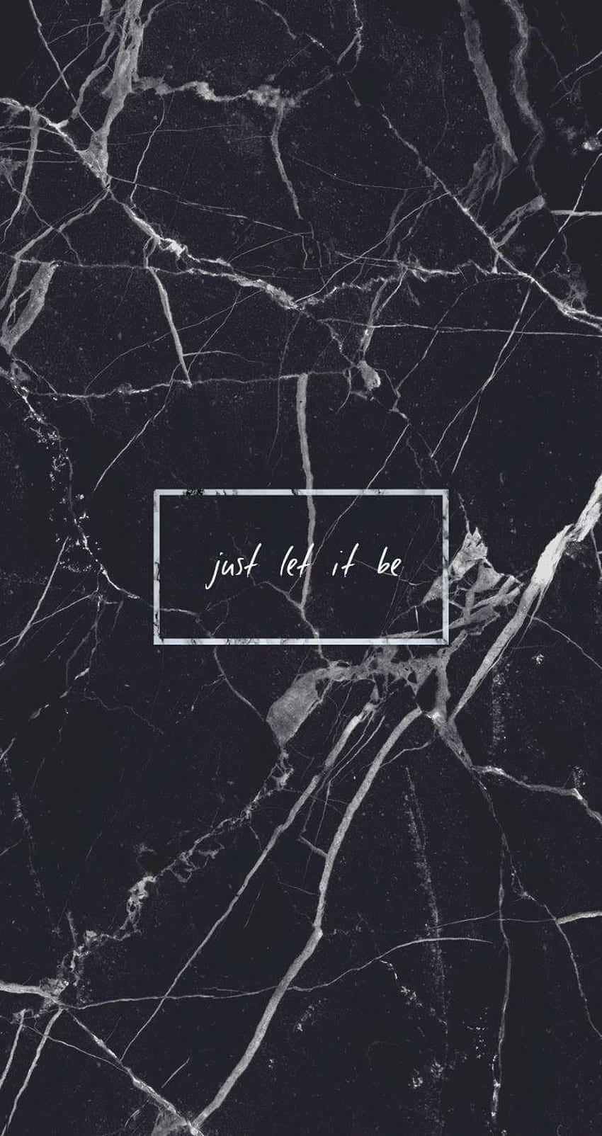 桌布 壁紙 — 深色大理石搭配白色紋理，中央有一個文字框寫著 just let it be。