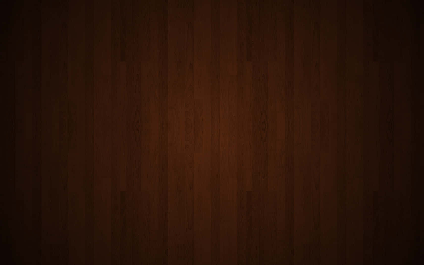 Brown Wood 桌布 壁紙 — 深色濃郁的棕色木地板，帶有天然木紋圖案和微妙的燈光漸變。