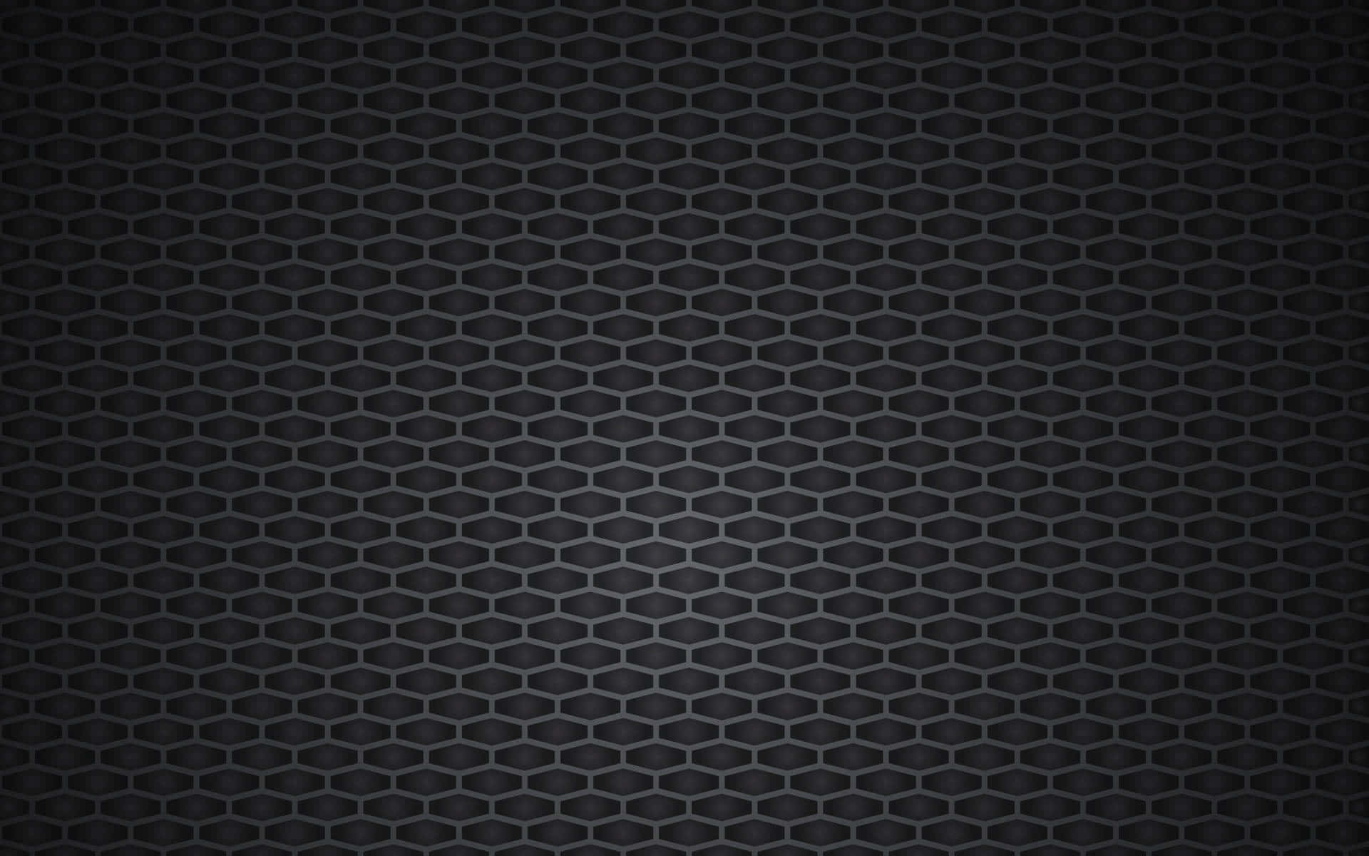 Black Pattern 桌布 壁紙 — 深色紋理六邊形網格圖案，表面帶有微妙的漸變照明。
