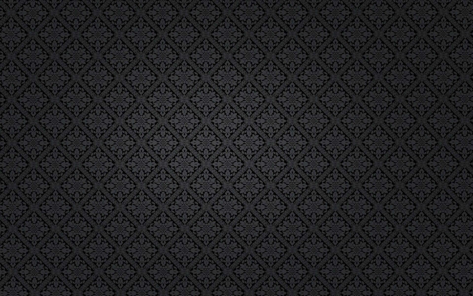 1920x1200 桌布 壁紙 — 深色紋理壁紙，帶有重複的菱形裝飾圖案，採用微妙的灰色調。
