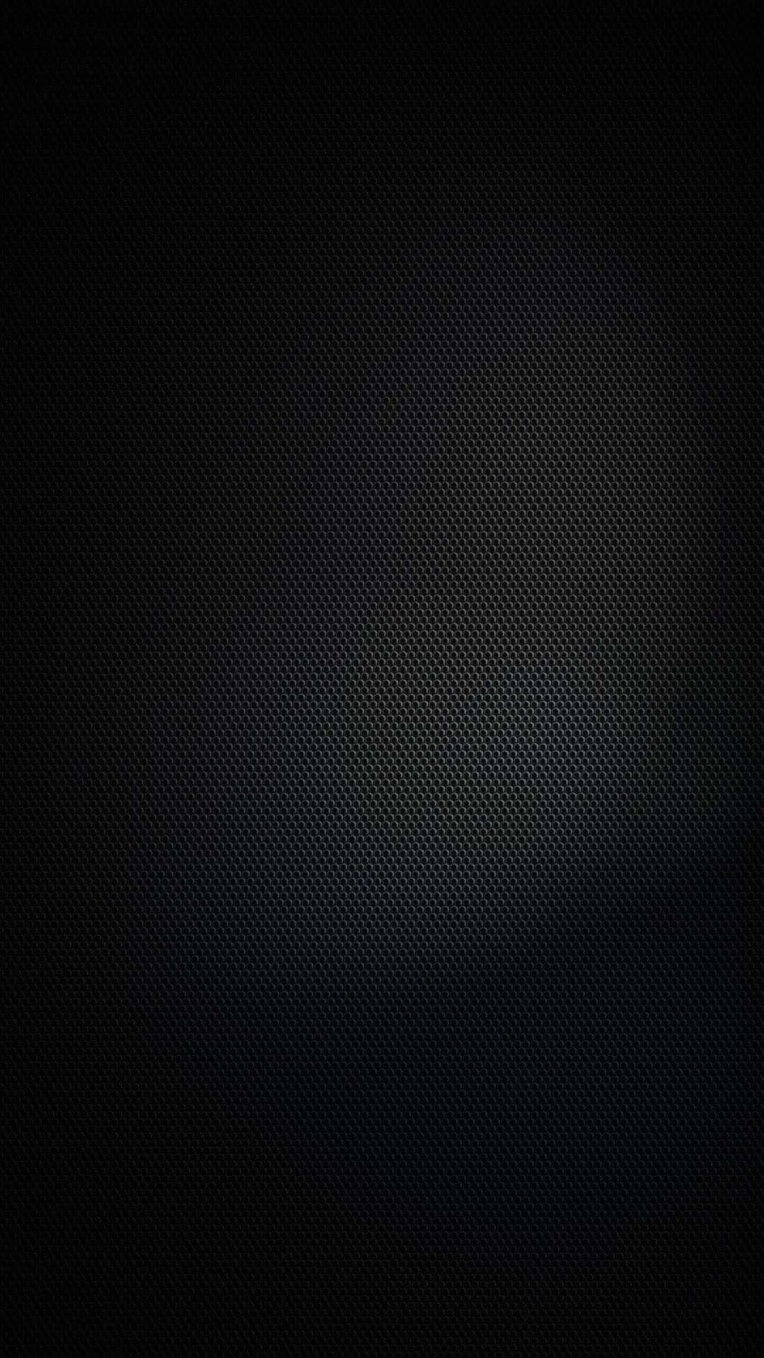 LED 桌布 壁紙 — 深色紋理碳纖維表面，中央帶有微妙的漸變光澤。