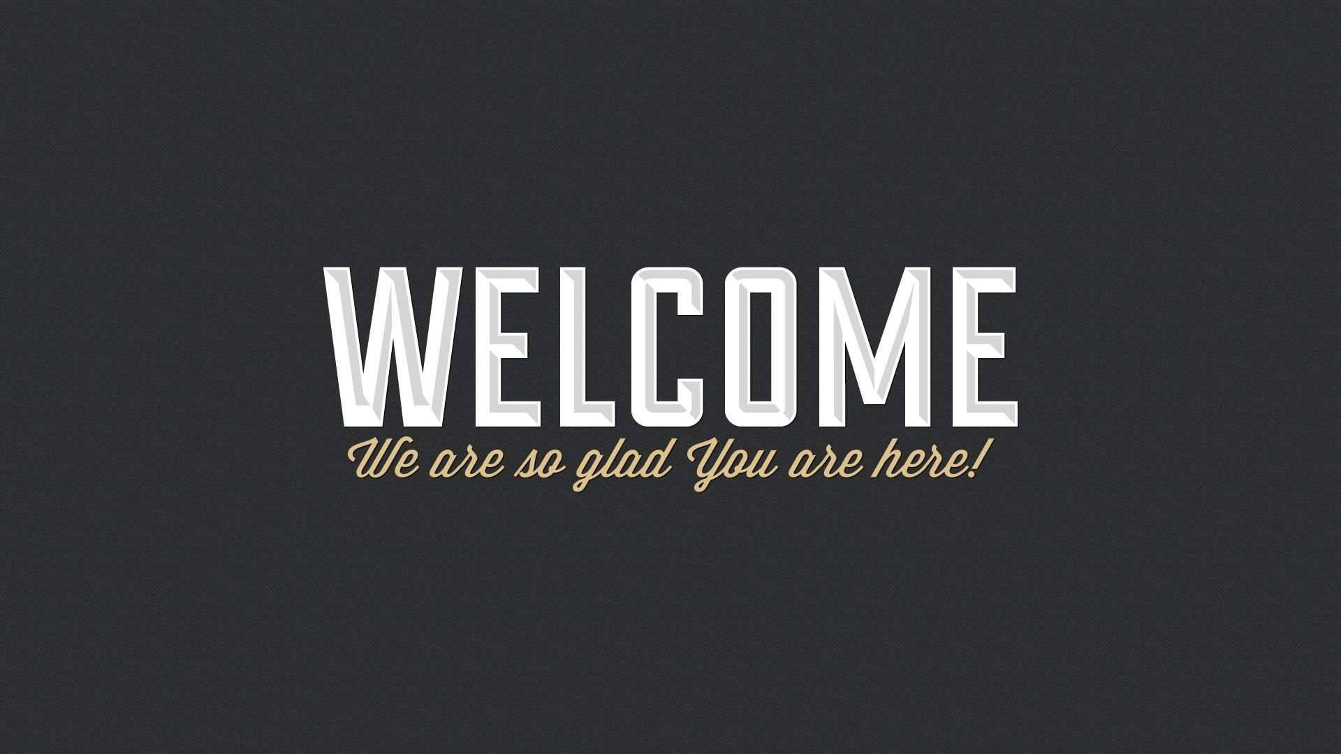Welcome 桌布 壁紙 — 深色紋理背景上，粗體白色 'WELCOME' 文字，下方有金色手寫字體。