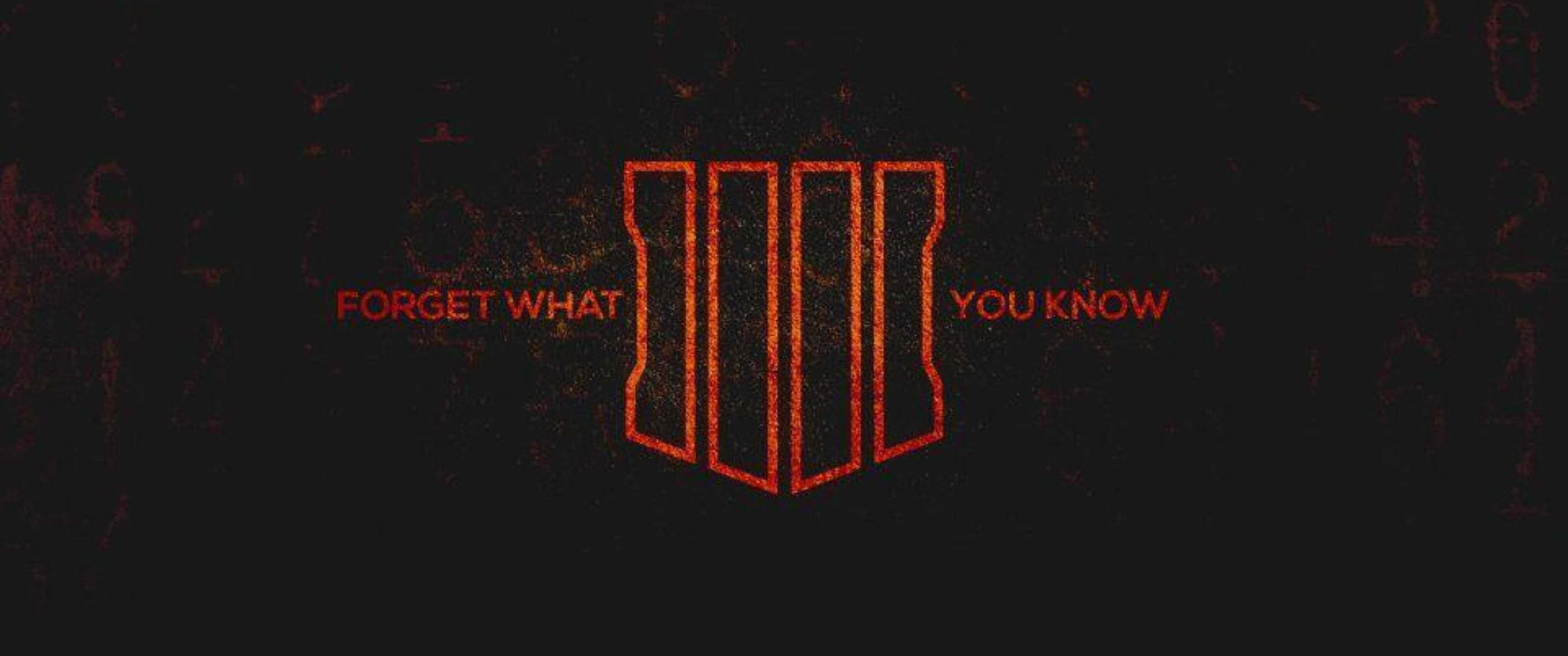 3440x1440p Call Of Duty Black Ops 4 桌布 壁紙 — 深色紋理背景上帶有發光的紅色文字和一個風格化的標誌，上面寫著 forget what you know。