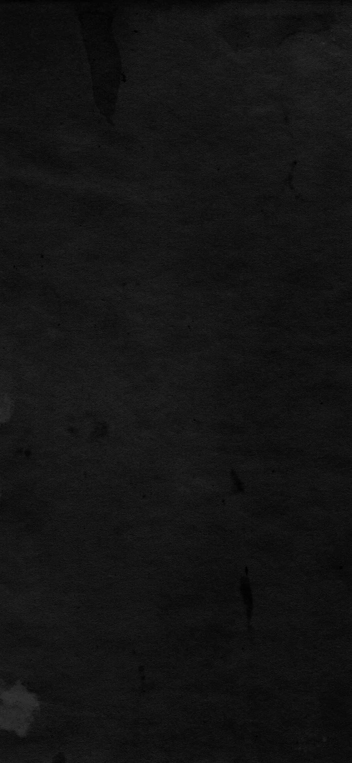 Black Gradient 桌布 壁紙 — 深色紋理表面，帶有微妙的灰色污跡和淡淡的白色污漬，營造出抽象極簡主義美學。