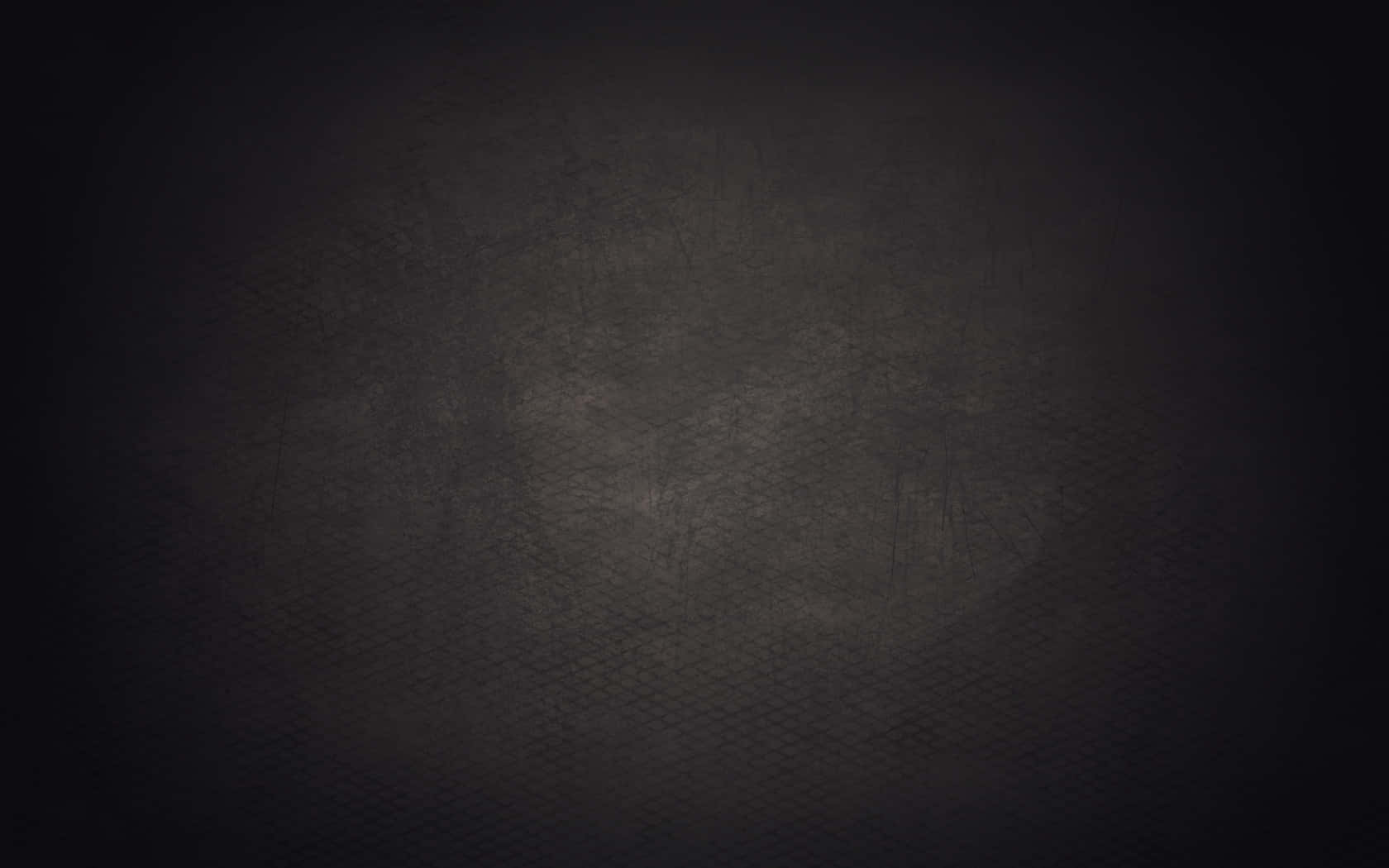 Screen 桌布 壁紙 — 深色紋理表面，帶有細微刮痕，邊緣柔和漸變至黑色。