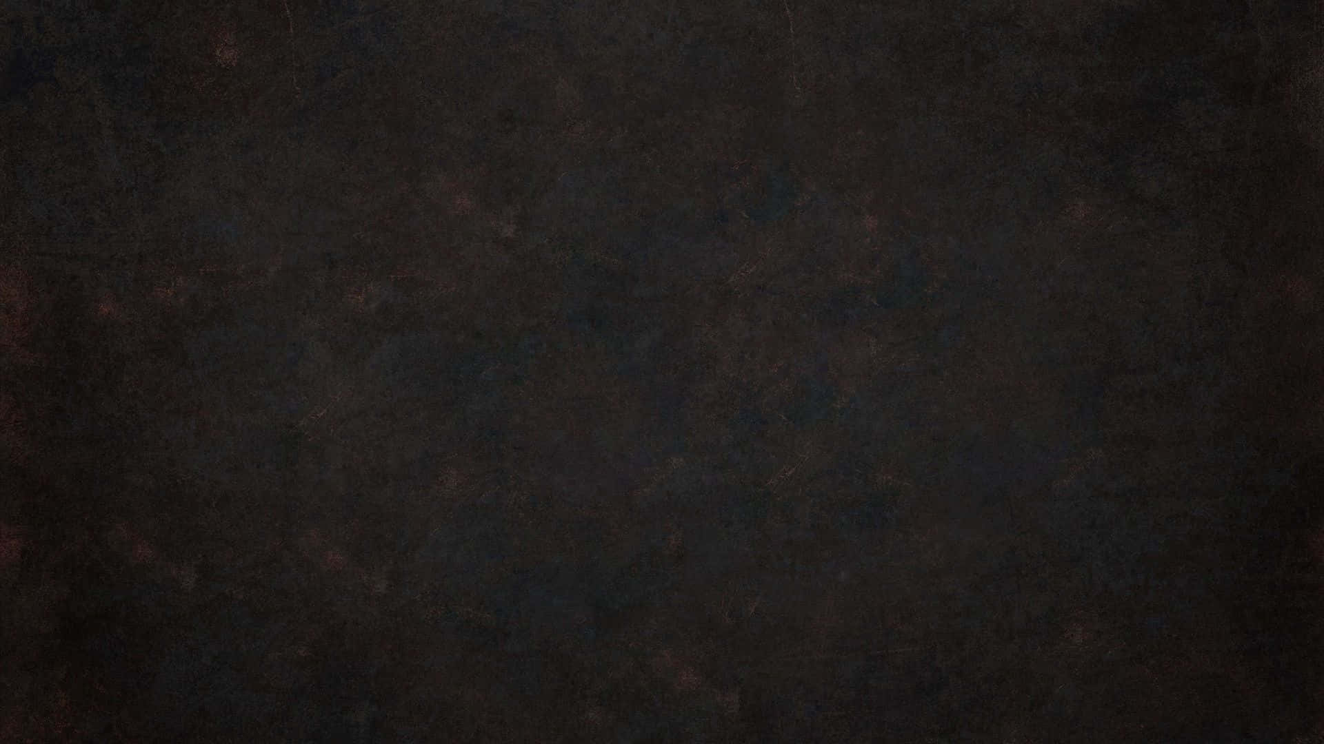 Black Grunge 桌布 壁紙 — 深色紋理表面帶有微妙的紅藍色斑點，營造出陰鬱的抽象背景。