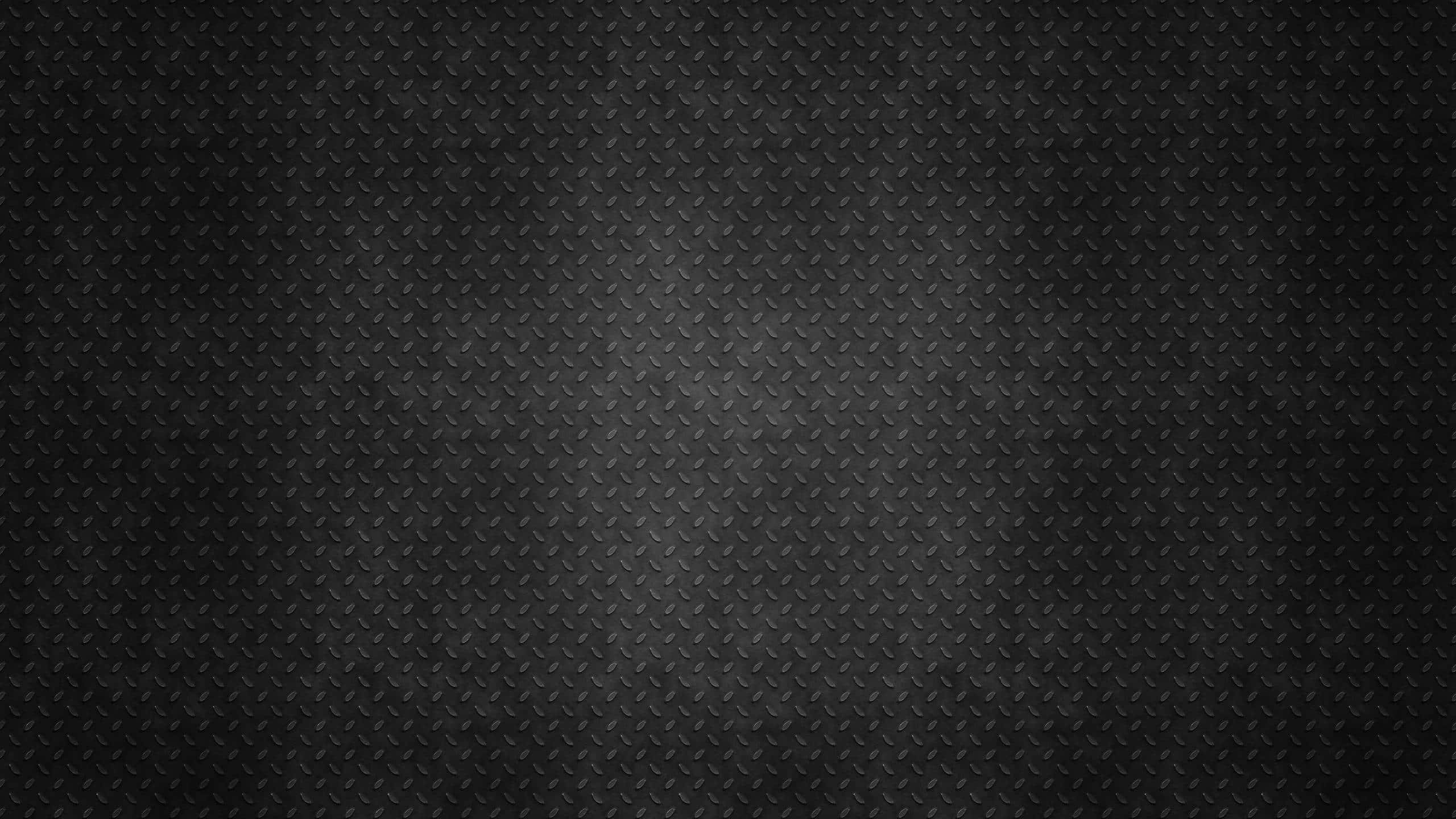 Aesthetic Black Grunge 桌布 壁紙 — 深色紋理鑽石板金屬表面，帶有微妙的漸變照明。