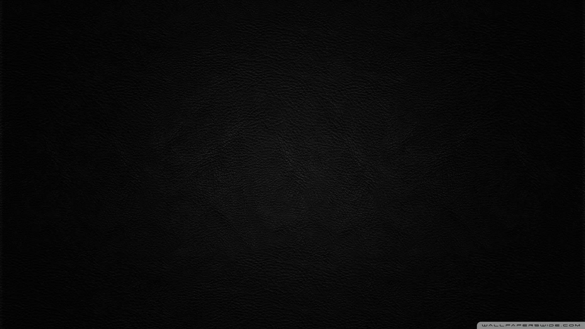 深色紋理黑色皮革表面，帶有細微的紋理圖案。 — 極簡動態 壁紙
