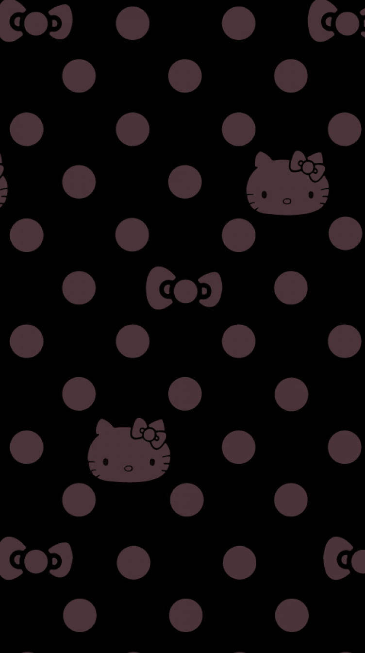 Kitty 桌布 壁紙 — 深色背景，帶有重複的粉紅色圓點和 Hello Kitty 臉孔及蝴蝶結，色調柔和。