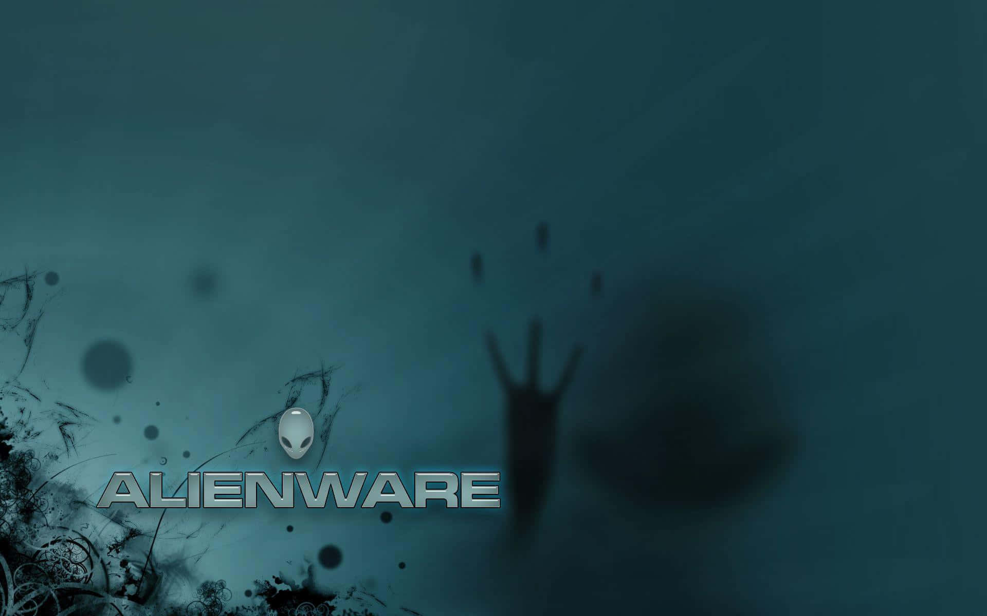 外星人 桌布 壁紙 — 深藍綠色Alienware品牌桌布，一隻幽靈般的手伸向發光的外星人頭標誌。