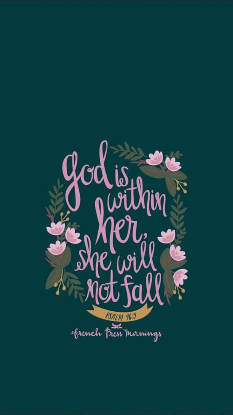 Girly Bible Verse 桌布 壁紙 — 深藍綠色背景上有一個花卉花環，粉紅色的花朵和綠色的葉子圍繞著優雅的草書文字，寫著 'God is within her she will not fall'，下方有 'Psalm 46:5' 和 'French Press Mornings'。