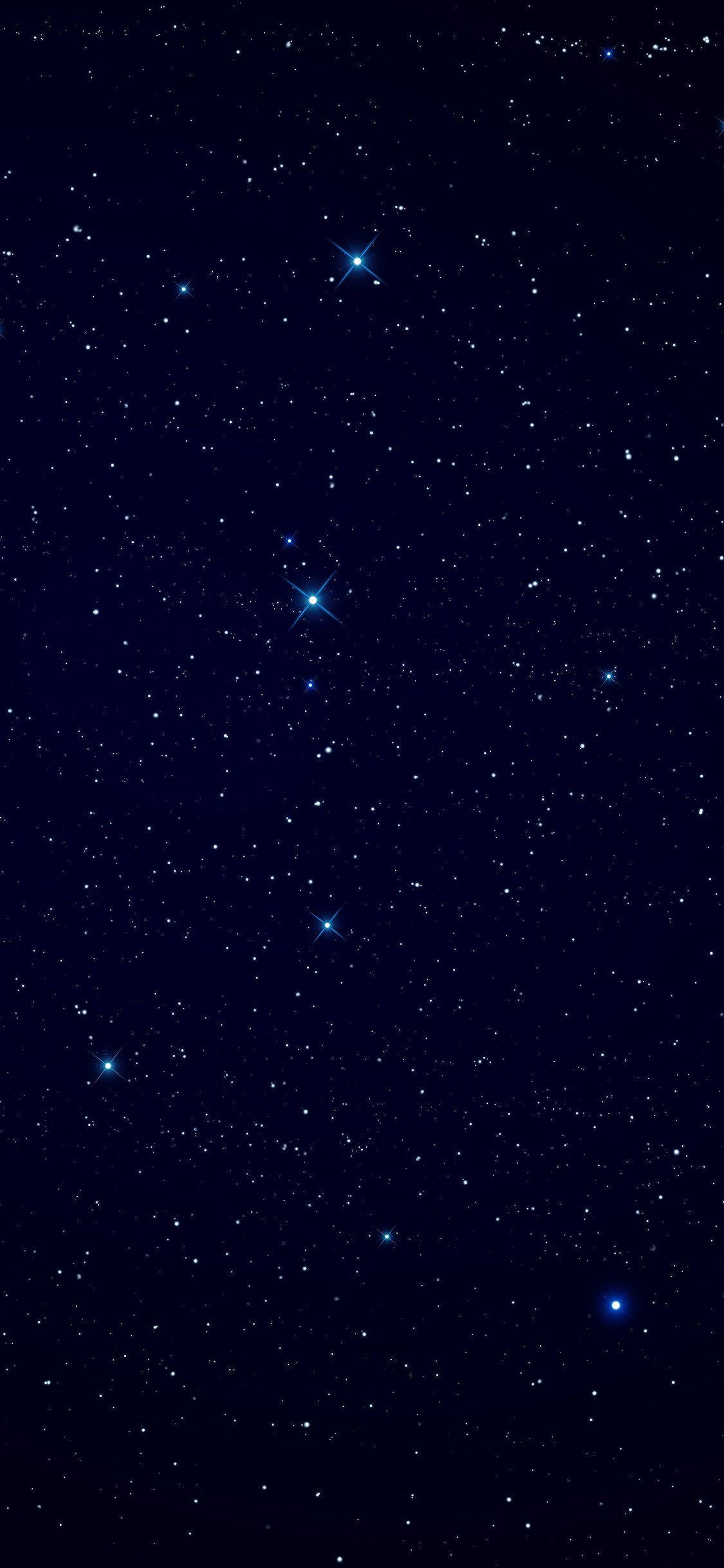 太空 iPhone 桌布 壁紙 — 深藍色夜空，充滿無數閃爍星星和幾顆帶有星爆效果的明亮藍色星星。