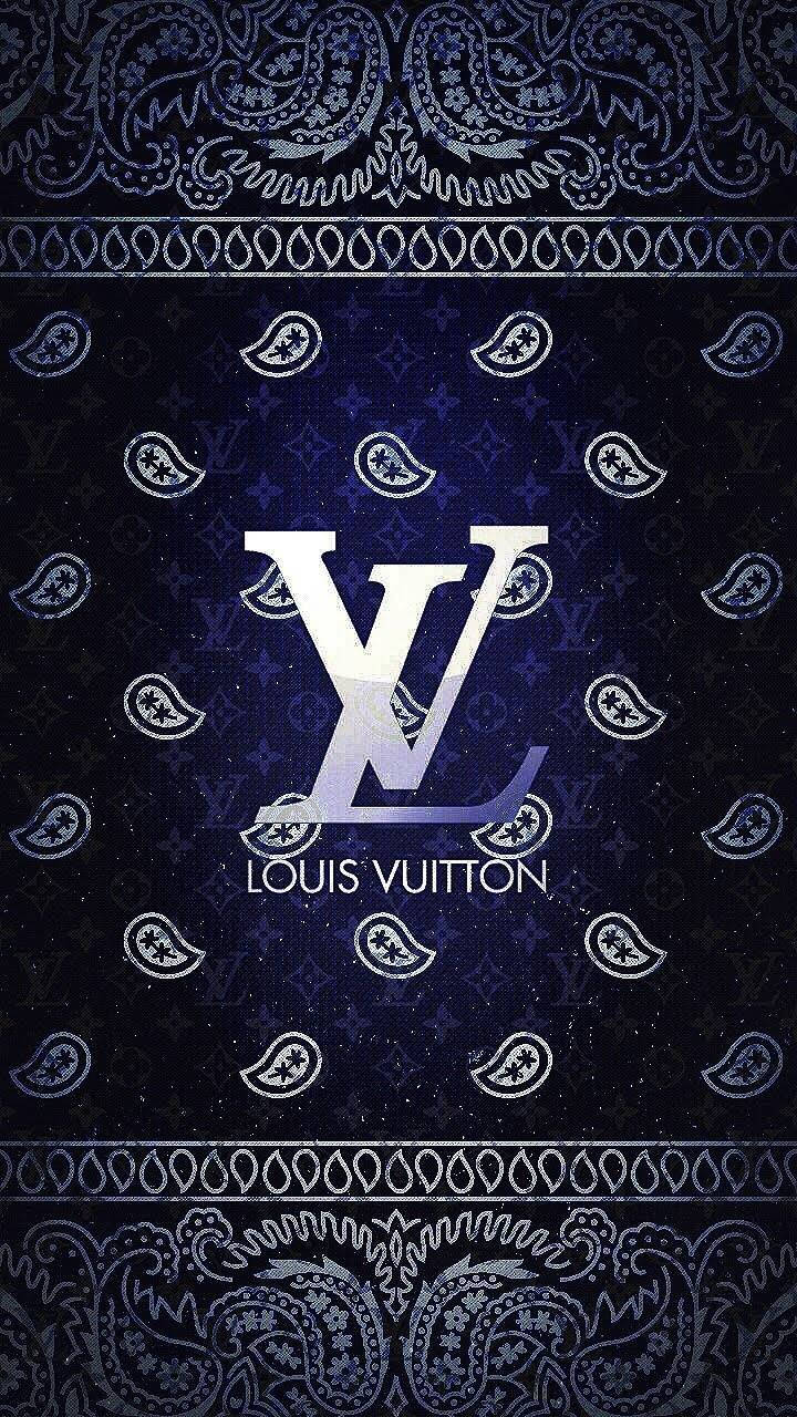bandana 桌布 壁紙 — 深藍色桌布，帶有突出的白色 Louis Vuitton 標誌，周圍環繞著佩斯利圖案和字母組合圖案。