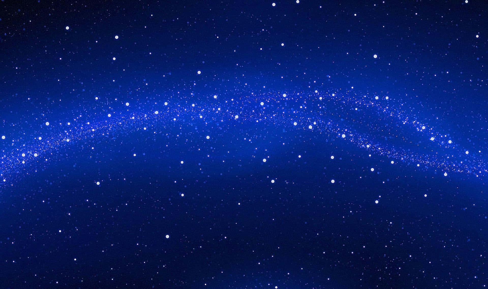 夜空 桌布 壁紙 — 深藍色的宇宙天空充滿閃爍的星星和一道發光的彎曲星雲橫跨天際。