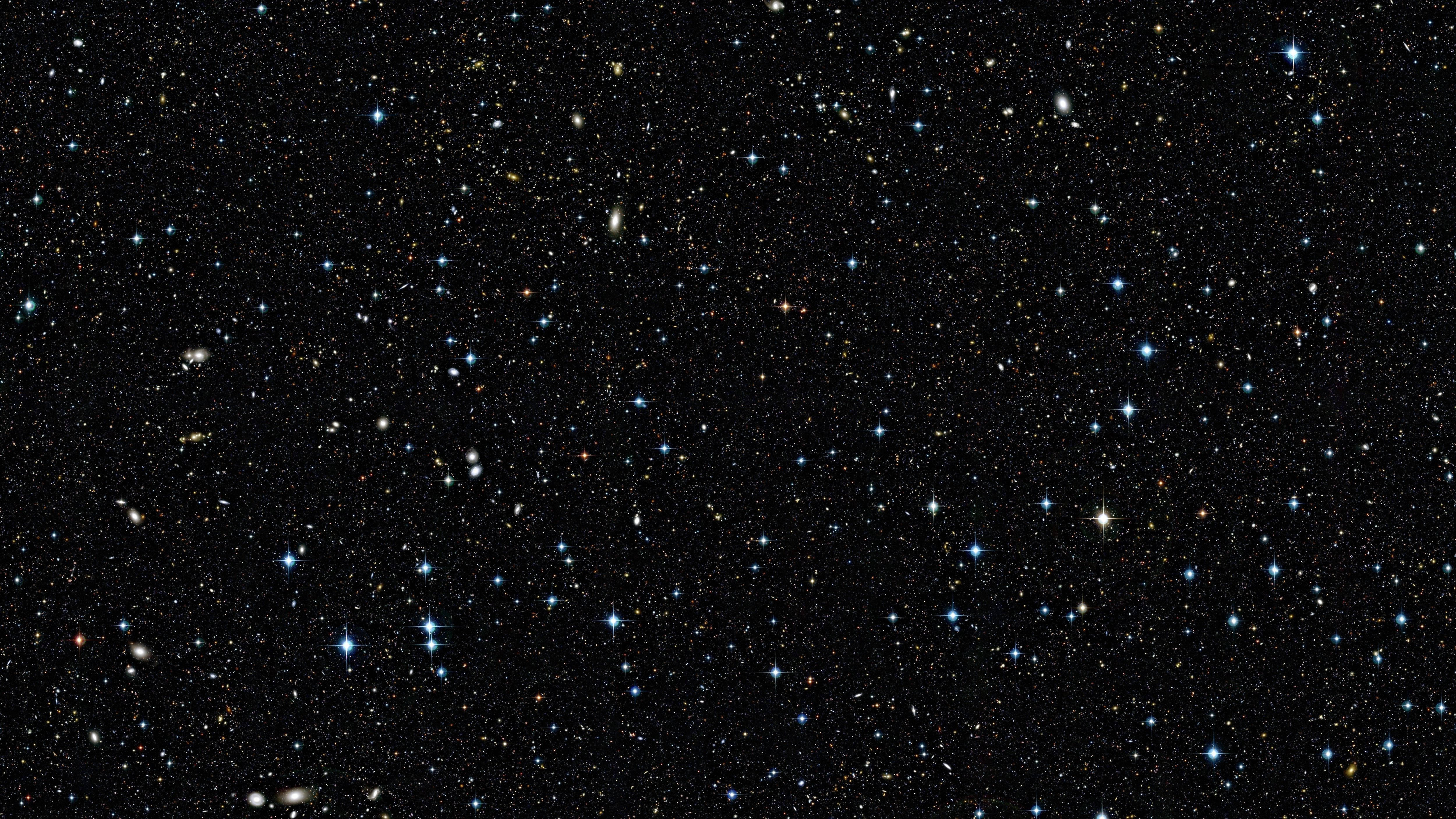 Star Space 桌布 壁紙 — 深邃太空景觀，充滿無數恆星和遙遠星系，在黑色虛空中閃耀。