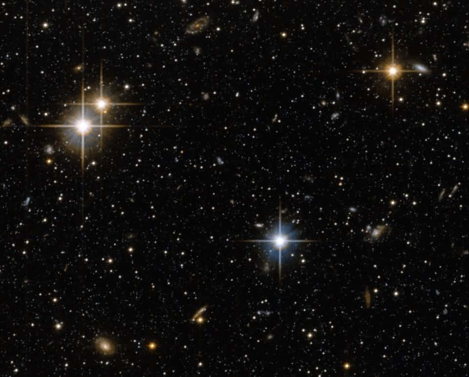 Stars 桌布 壁紙 — 深邃太空視野，充滿無數恆星和遙遠星系，在黑色虛空中閃耀。