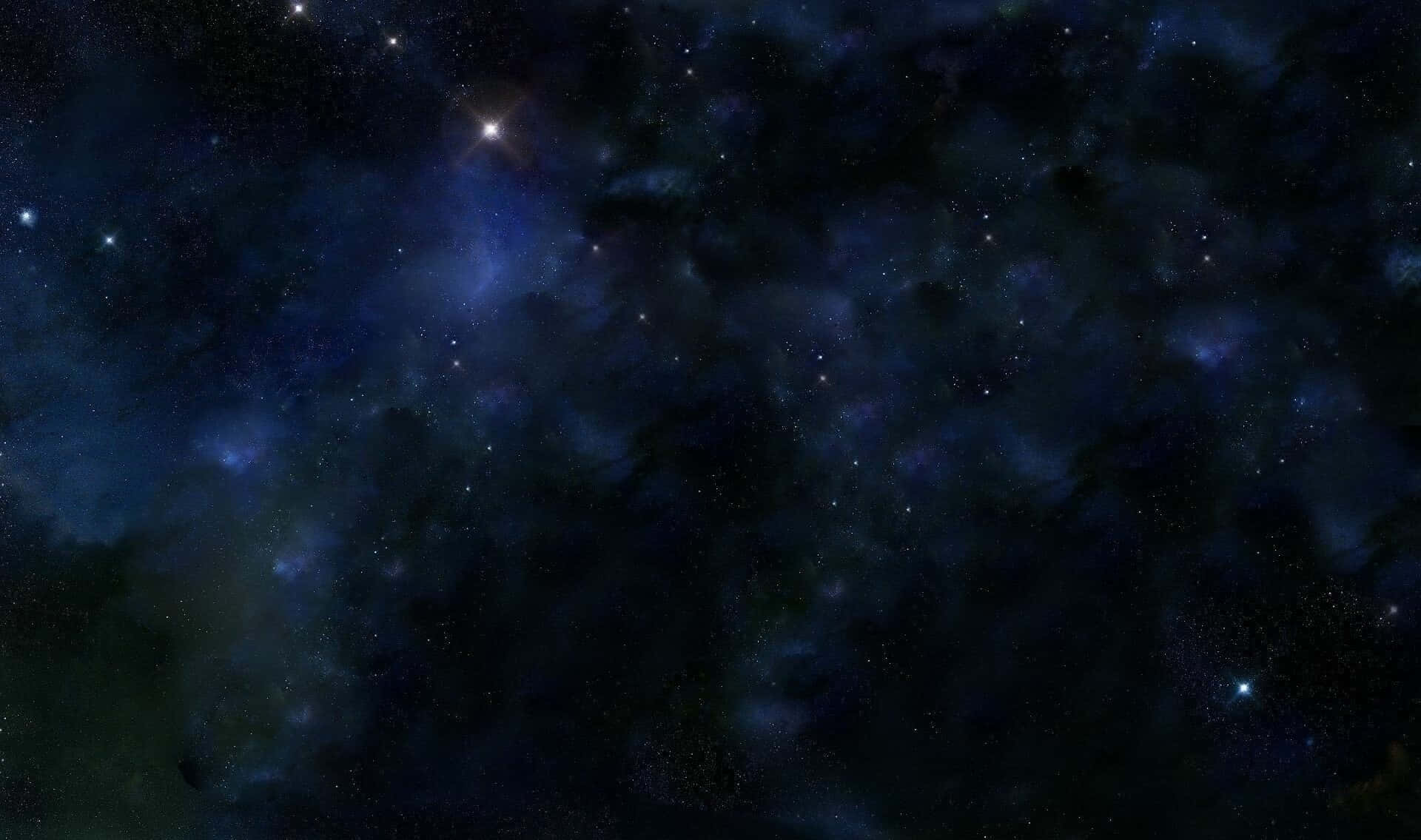 宇宙 桌布 壁紙 — 深邃的宇宙景觀，充滿發光的藍色星雲和散落的星星，映襯著黑暗的虛空。