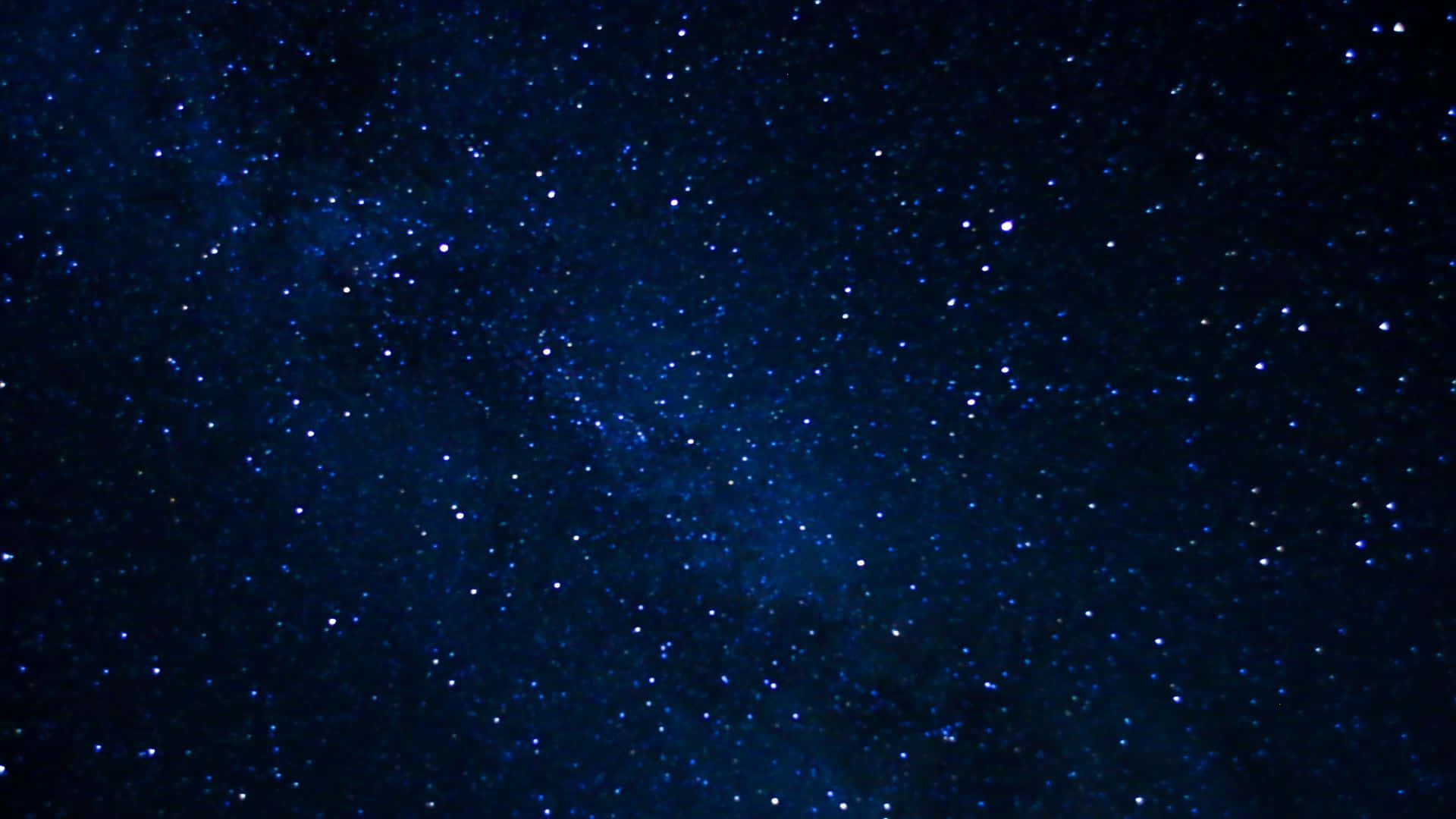 星空動畫 桌布 壁紙 — 深邃的藍色夜空，充滿無數閃爍的星星和微妙的宇宙塵埃雲。