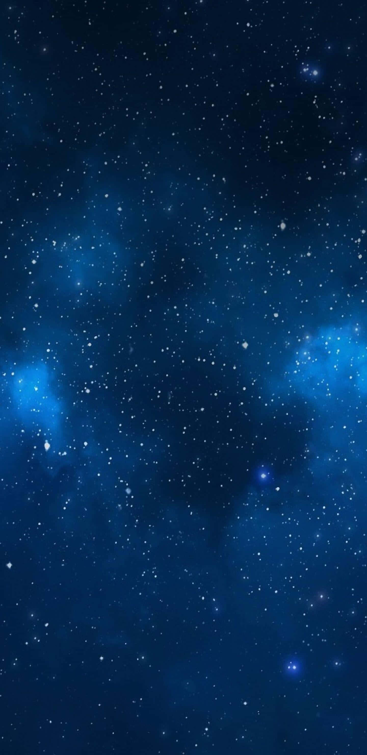 桌布 壁紙 — 深邃的藍色宇宙空間，佈滿閃爍的星星和發光的星雲，映襯著黑暗的虛空。