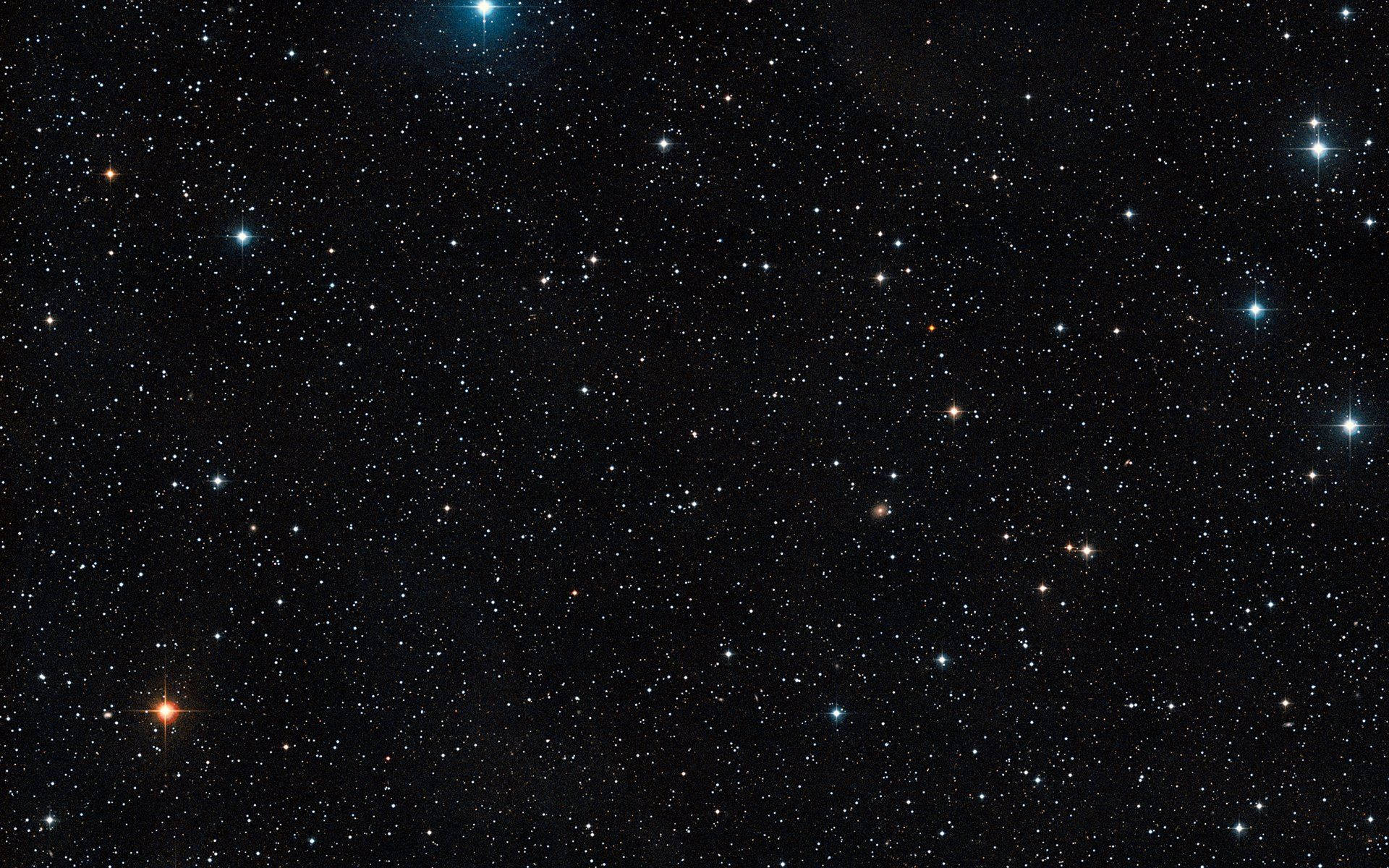 夜空 桌布 壁紙 — 深邃的黑色天空，佈滿無數閃爍的星星，亮度與顏色各異，包括藍色、白色和橙色色調。